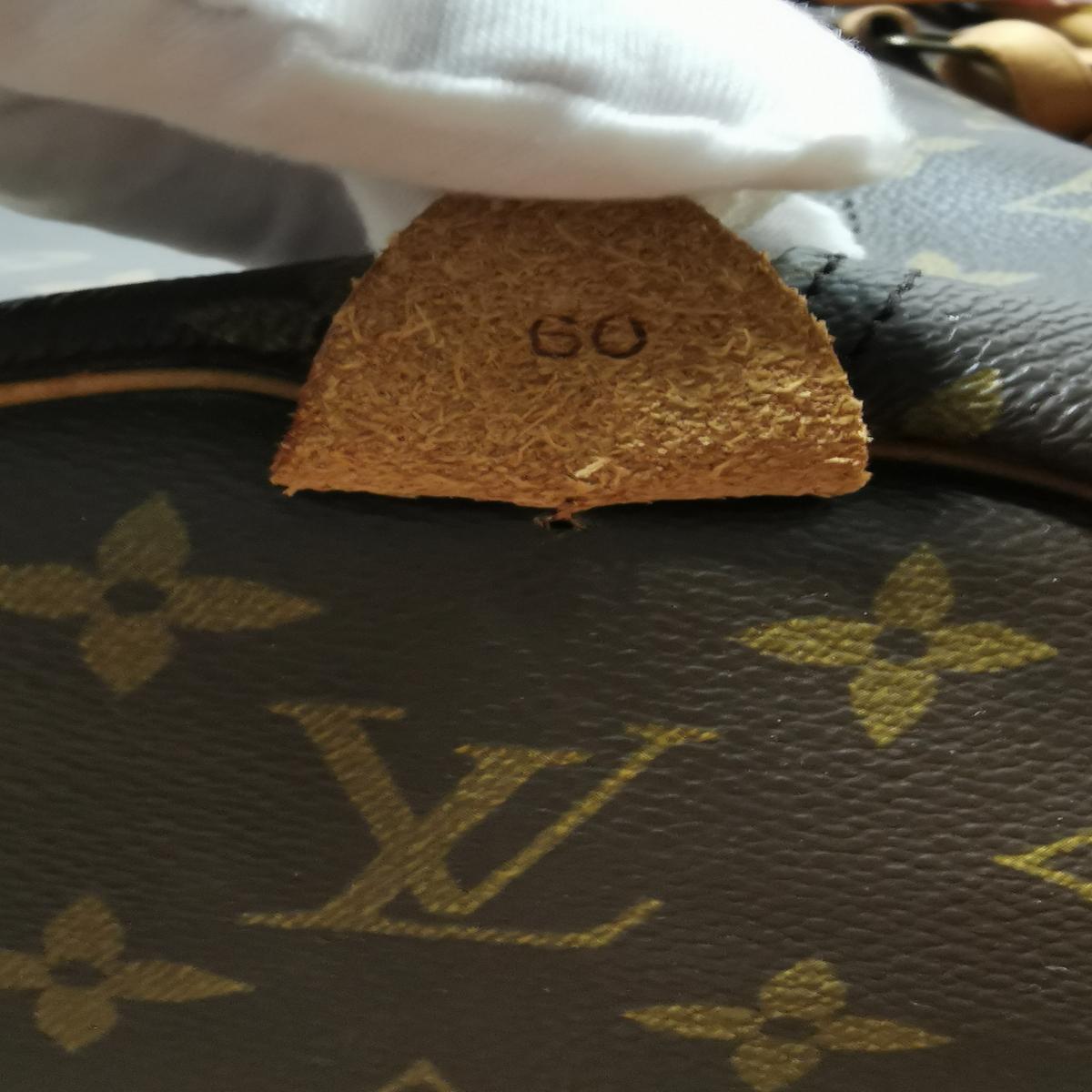 LOUIS VUITTON Keepall 60 canvas and leather travel bag Brown S082427