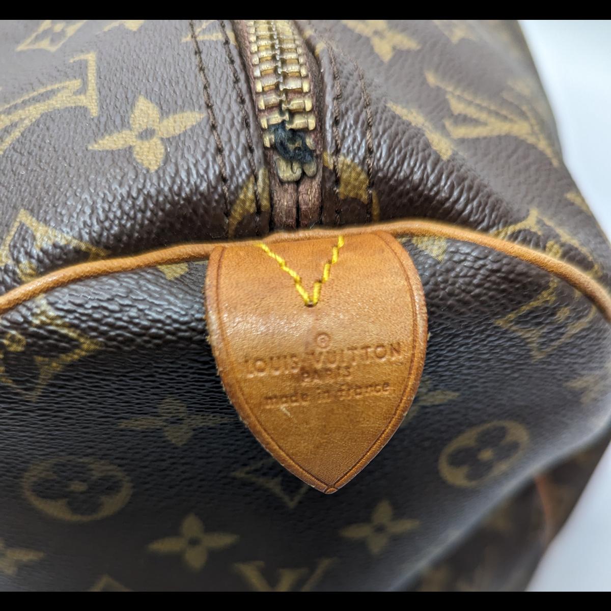 LOUIS VUITTON Keepall 55 canvas and leather travel bag Brown S072425