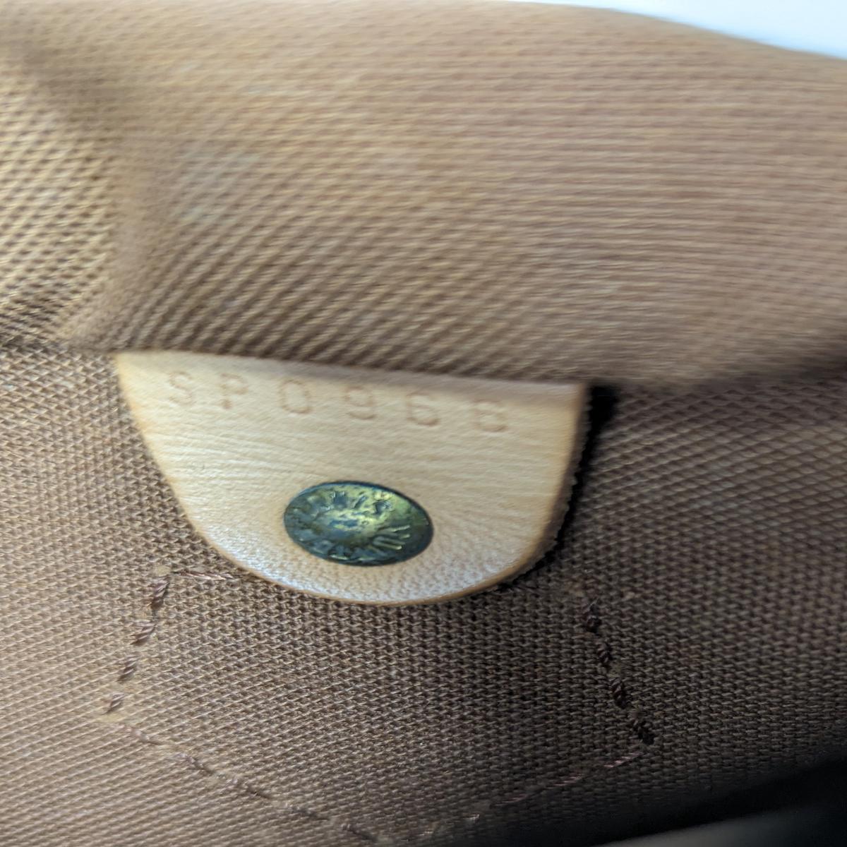 LOUIS VUITTON Speedy 25 canvas and leather handbag Brown