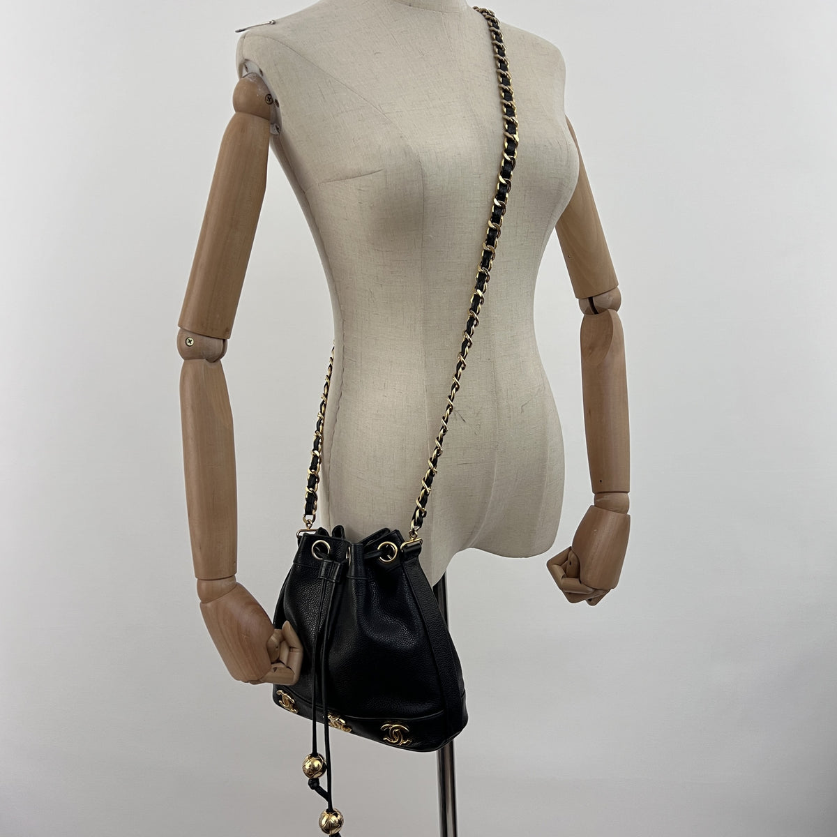 Vintage 1996-1997 CHANEL black lambskin mini bucket bag