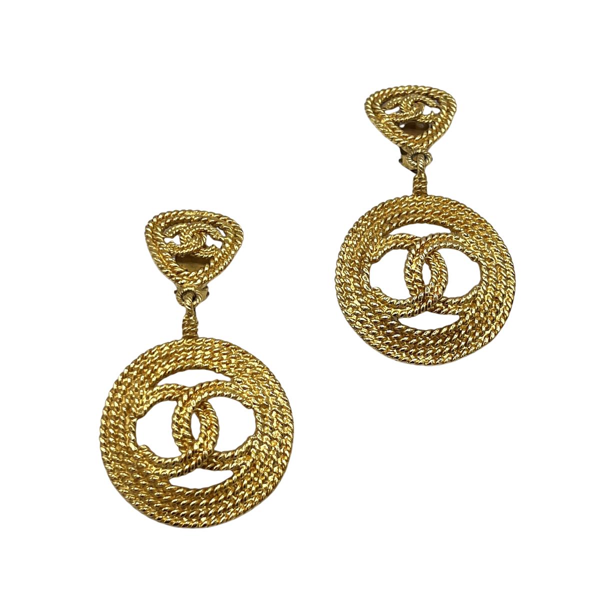 Boucles d'oreilles CHANEL CC Clip On métal doré