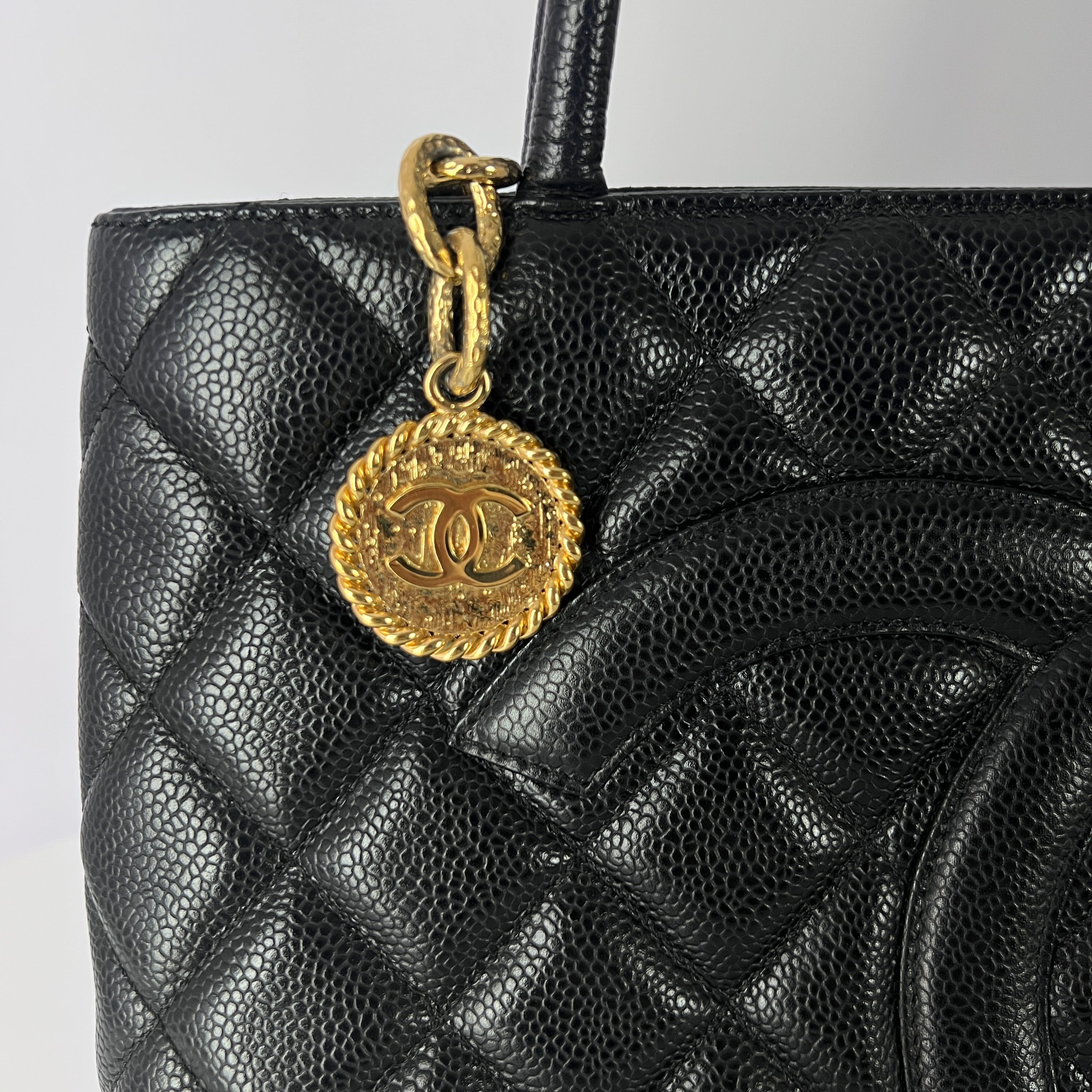 CHANEL Medaillon black leather handbag
