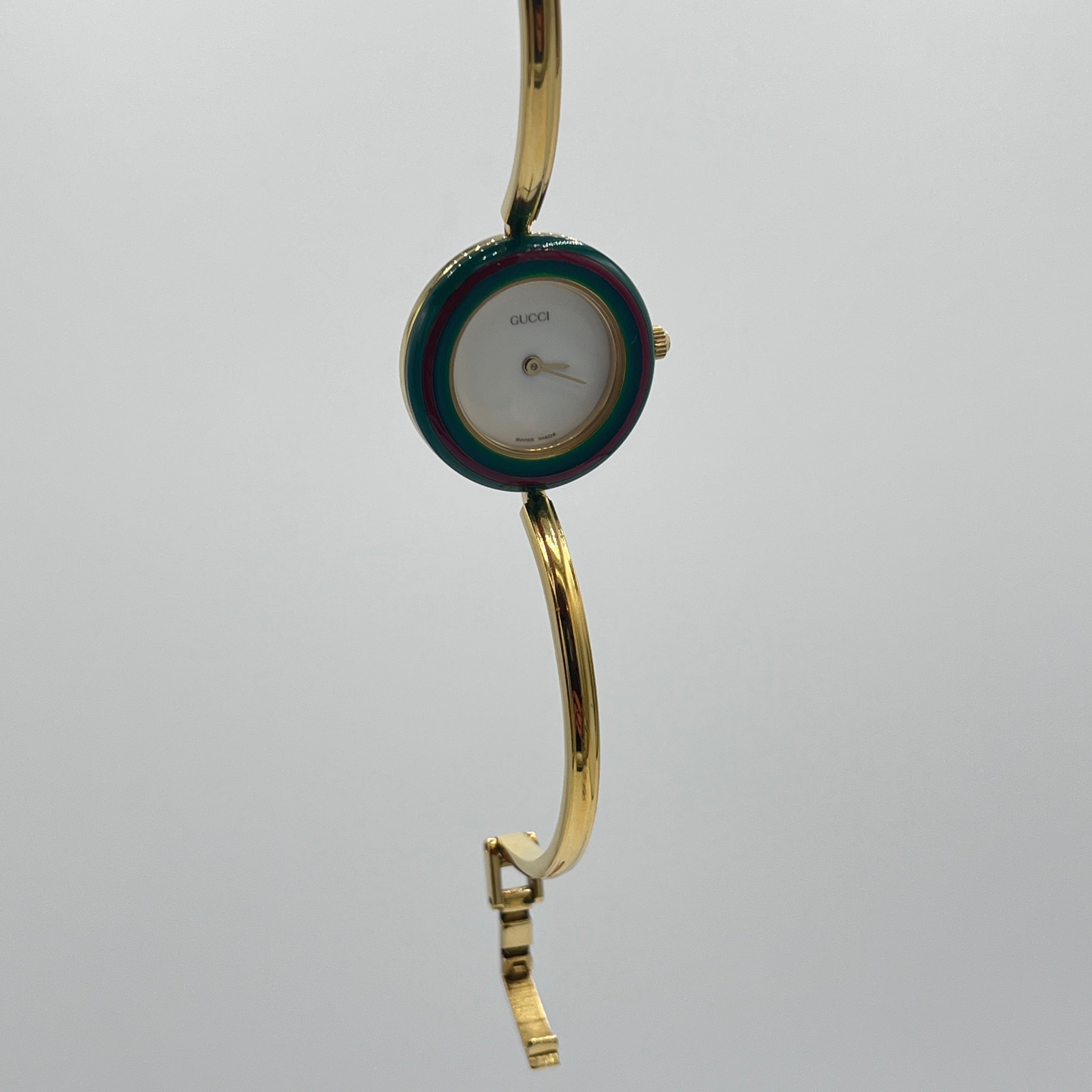Montre GUCCI 11/12.2 plaqué or doré