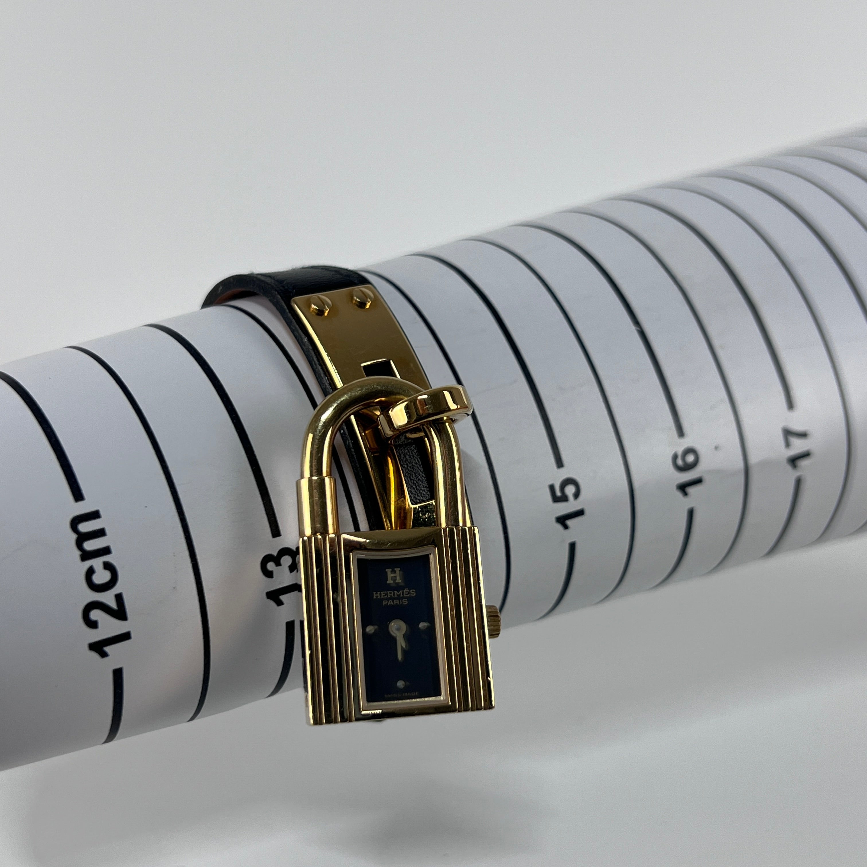 HERMÈS Kelly gold-plated watch