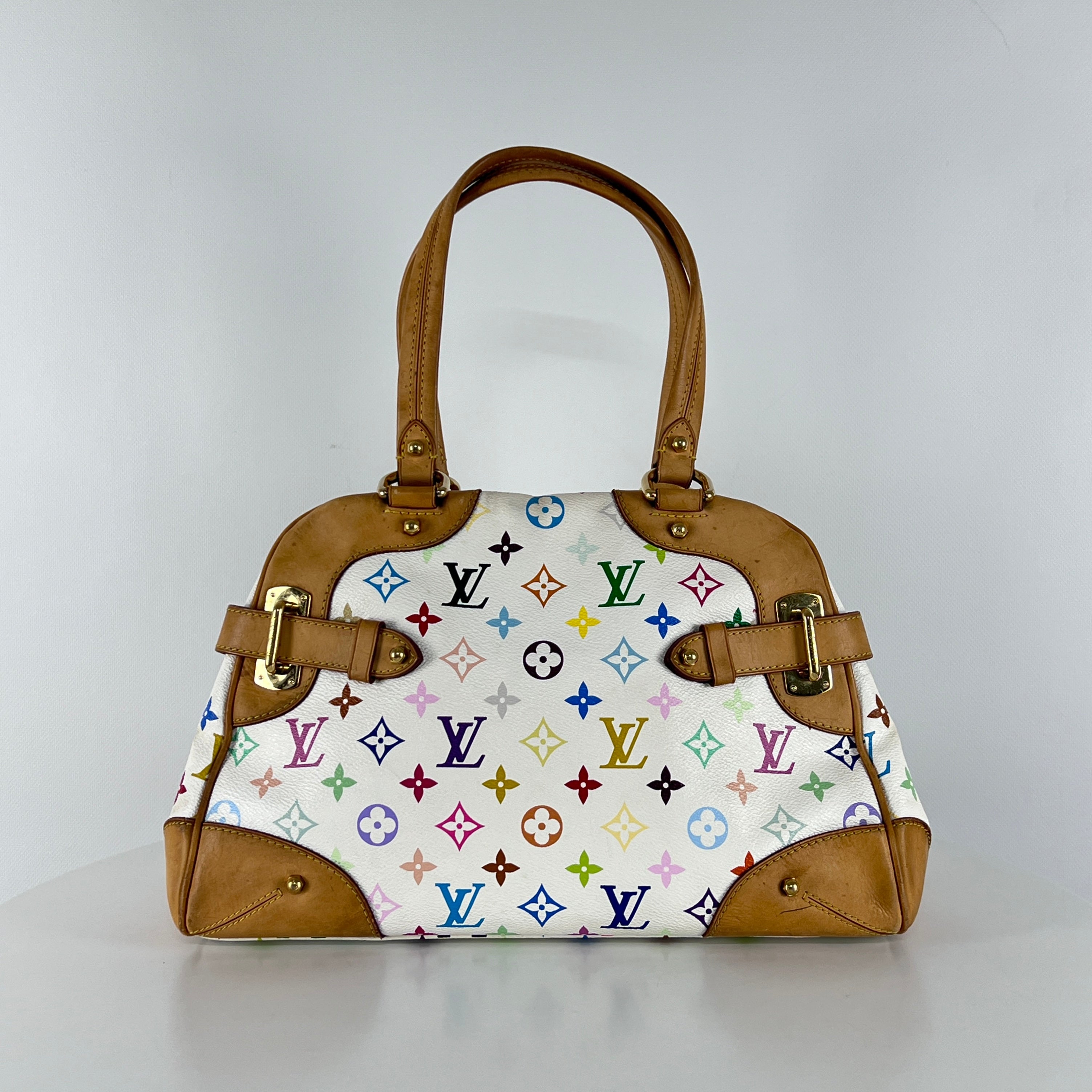 Sac à main LOUIS VUITTON Claudia toile et cuir marron