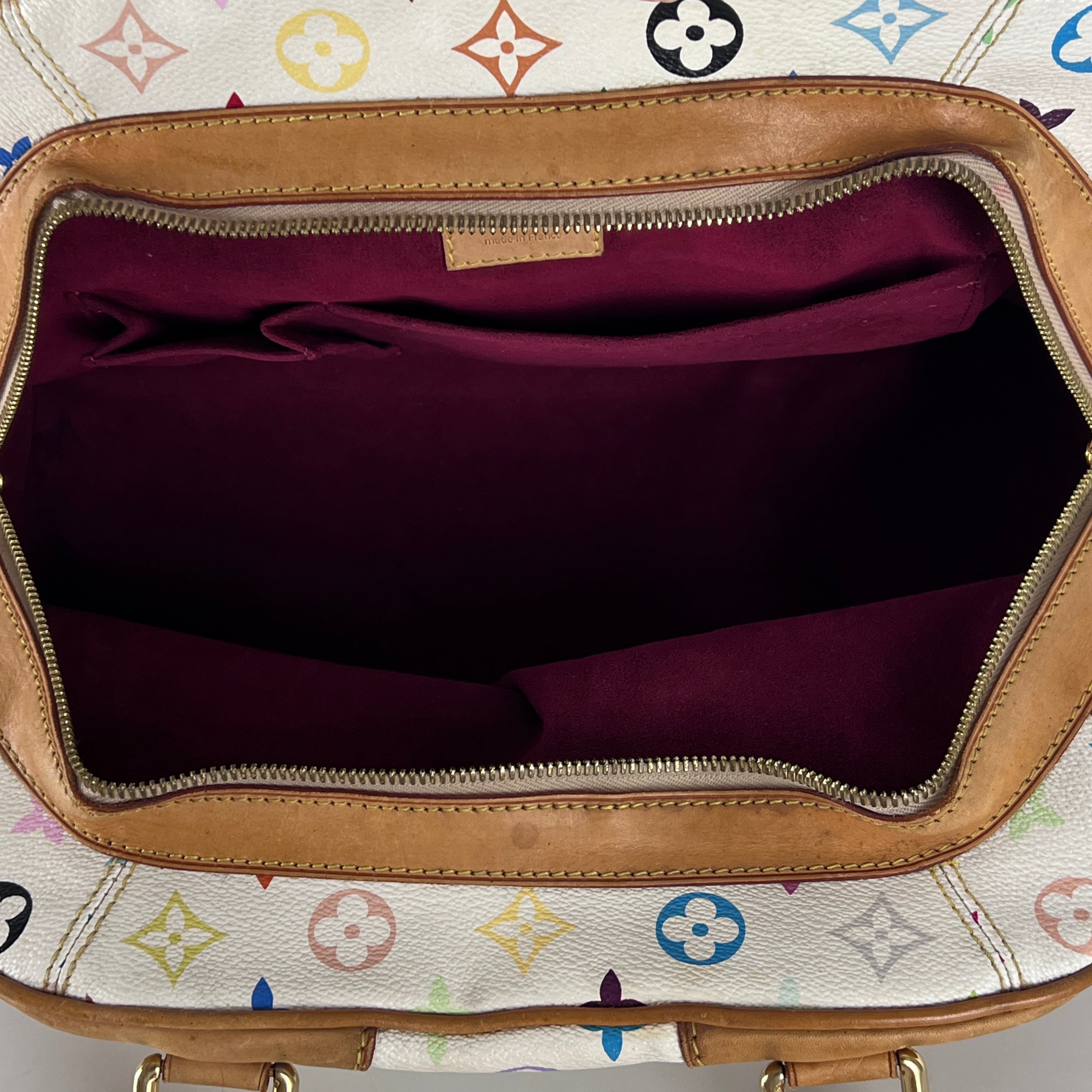 Sac à main LOUIS VUITTON Claudia toile et cuir marron