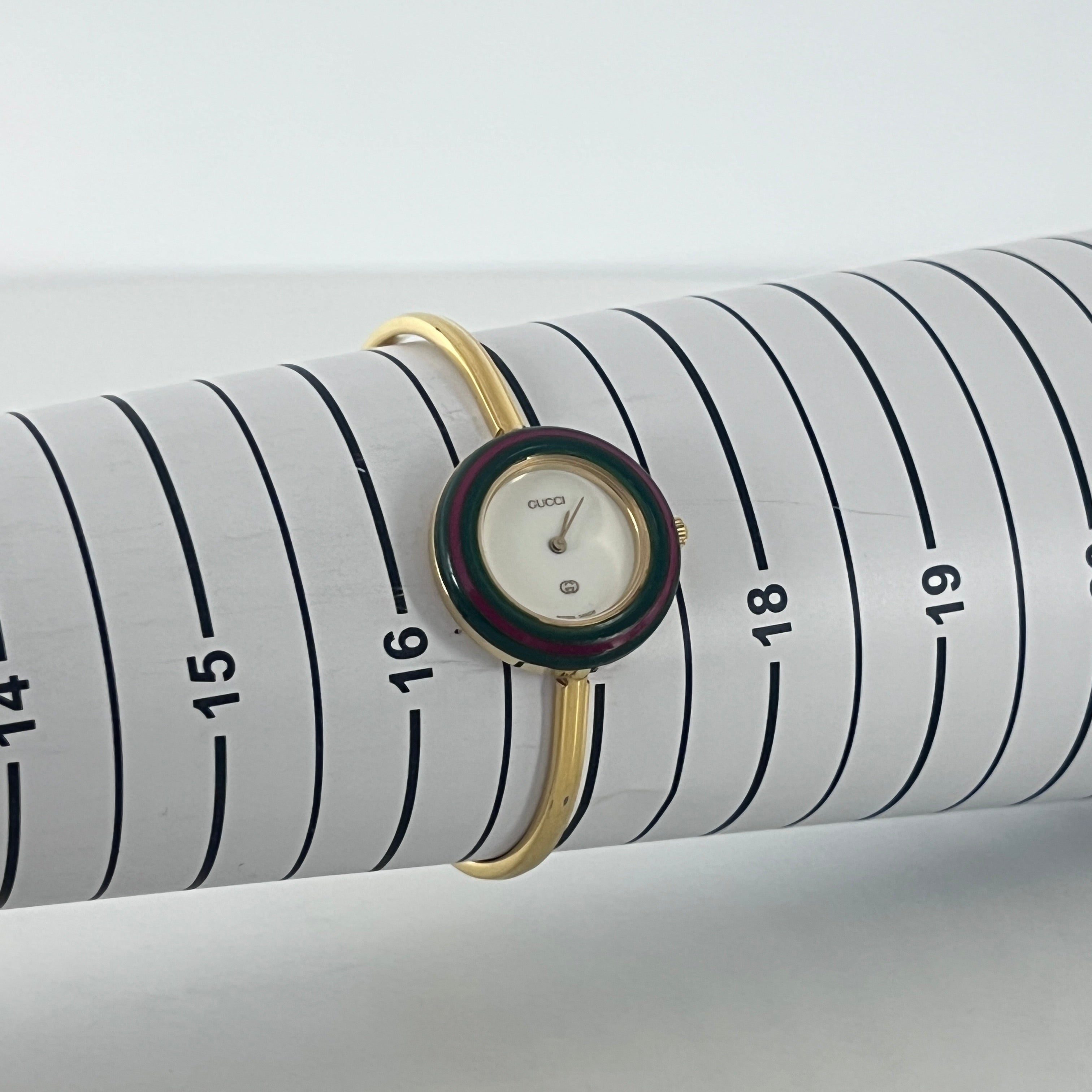 Montre GUCCI 11/12 plaqué or doré