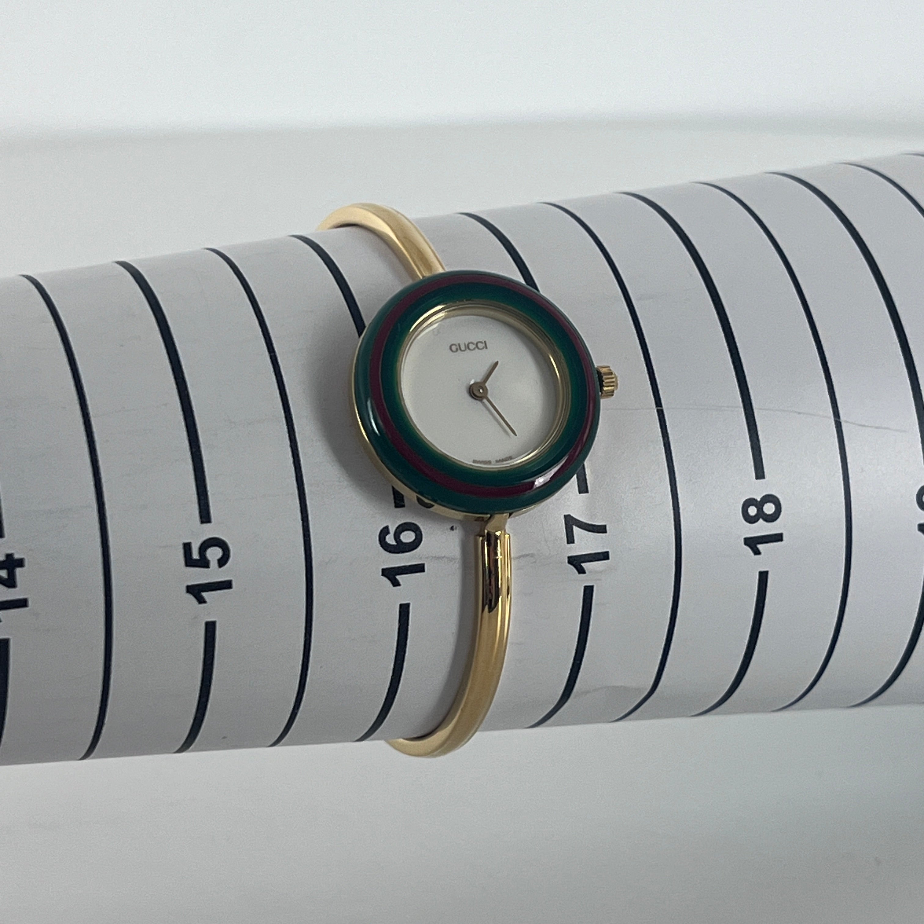 Montre GUCCI 11/12.2 plaqué or doré