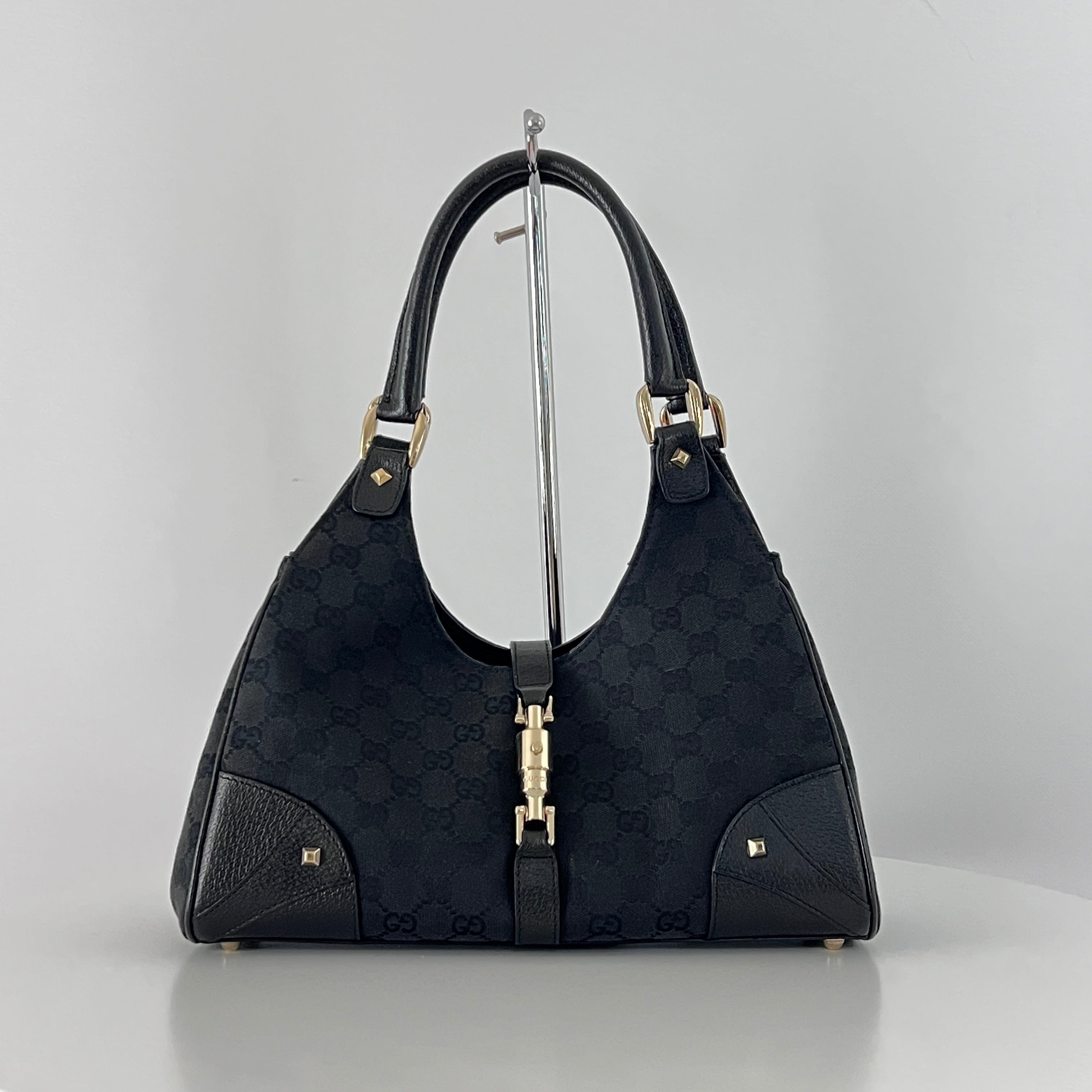 Sac à main GUCCI Jackie toile et cuir noir