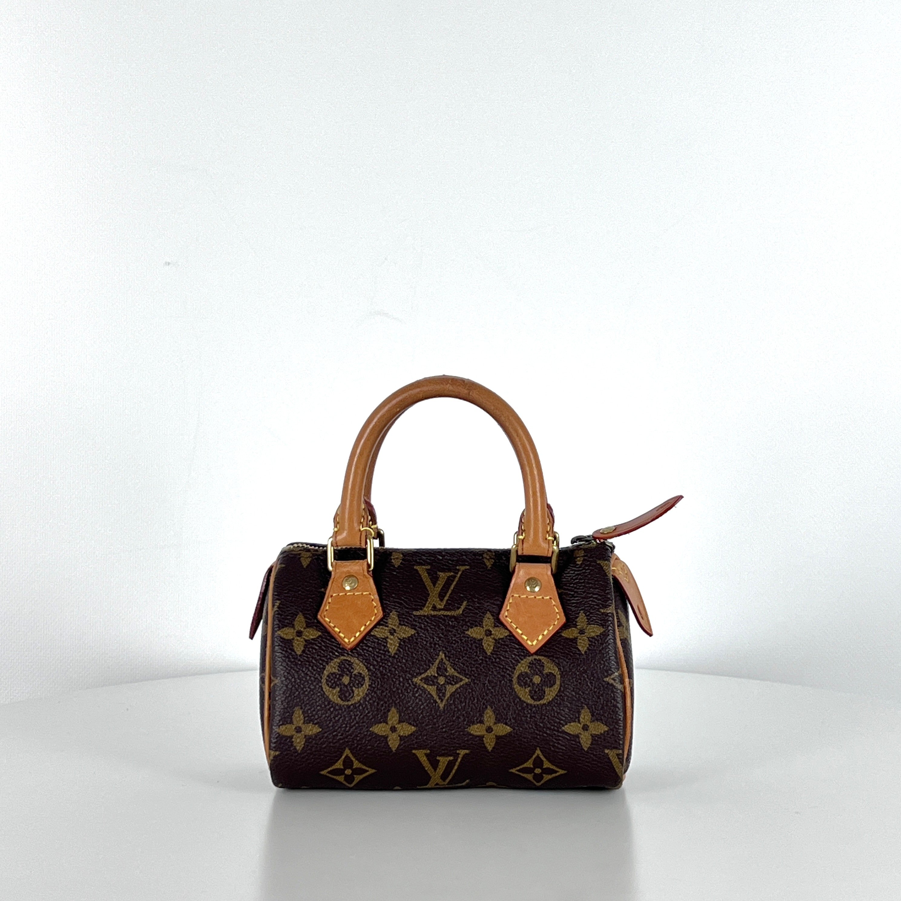 Sac à main LOUIS VUITTON Nano Speedy toile et cuir marron