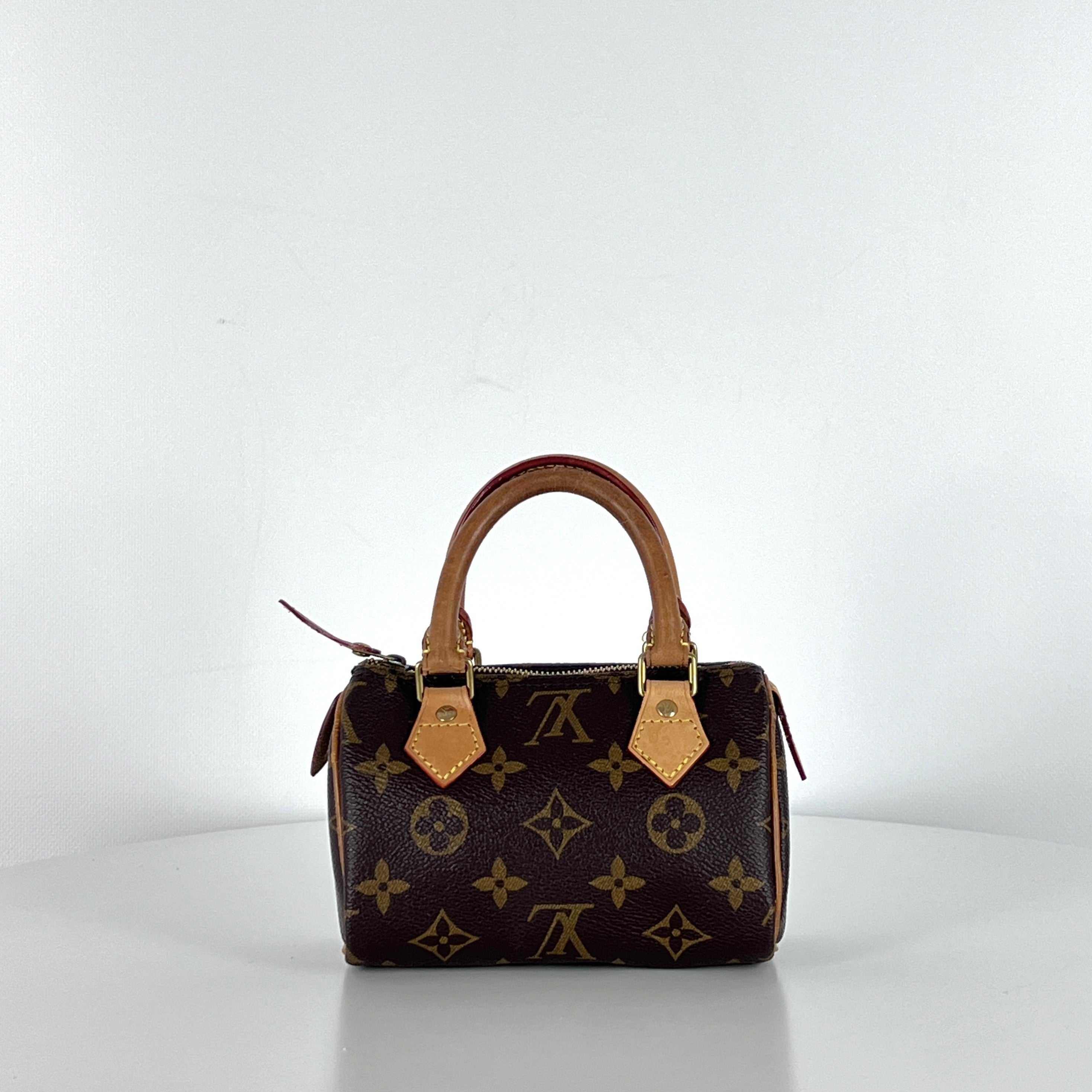 Sac à main LOUIS VUITTON Nano Speedy toile et cuir marron