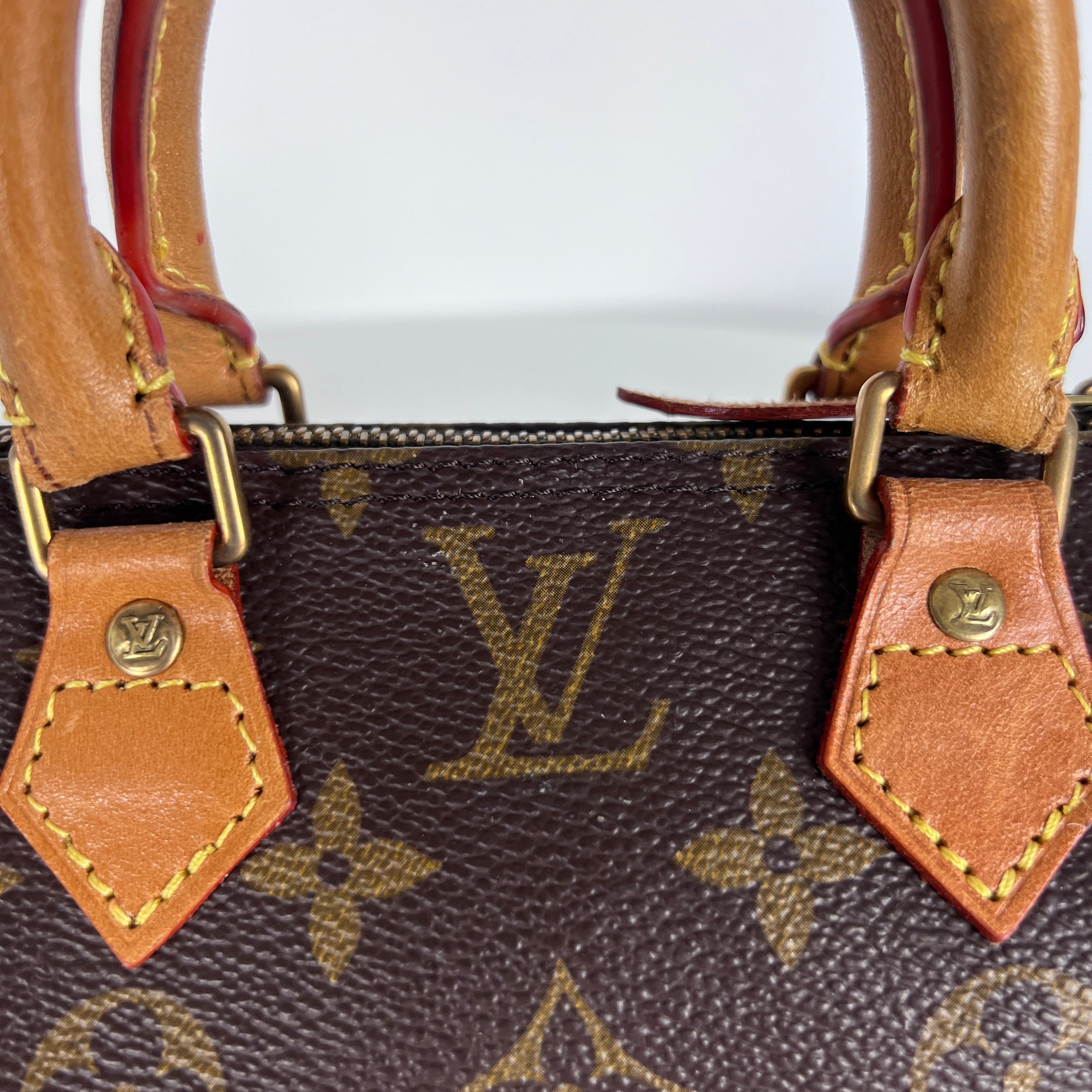Sac à main LOUIS VUITTON Nano Speedy toile et cuir marron