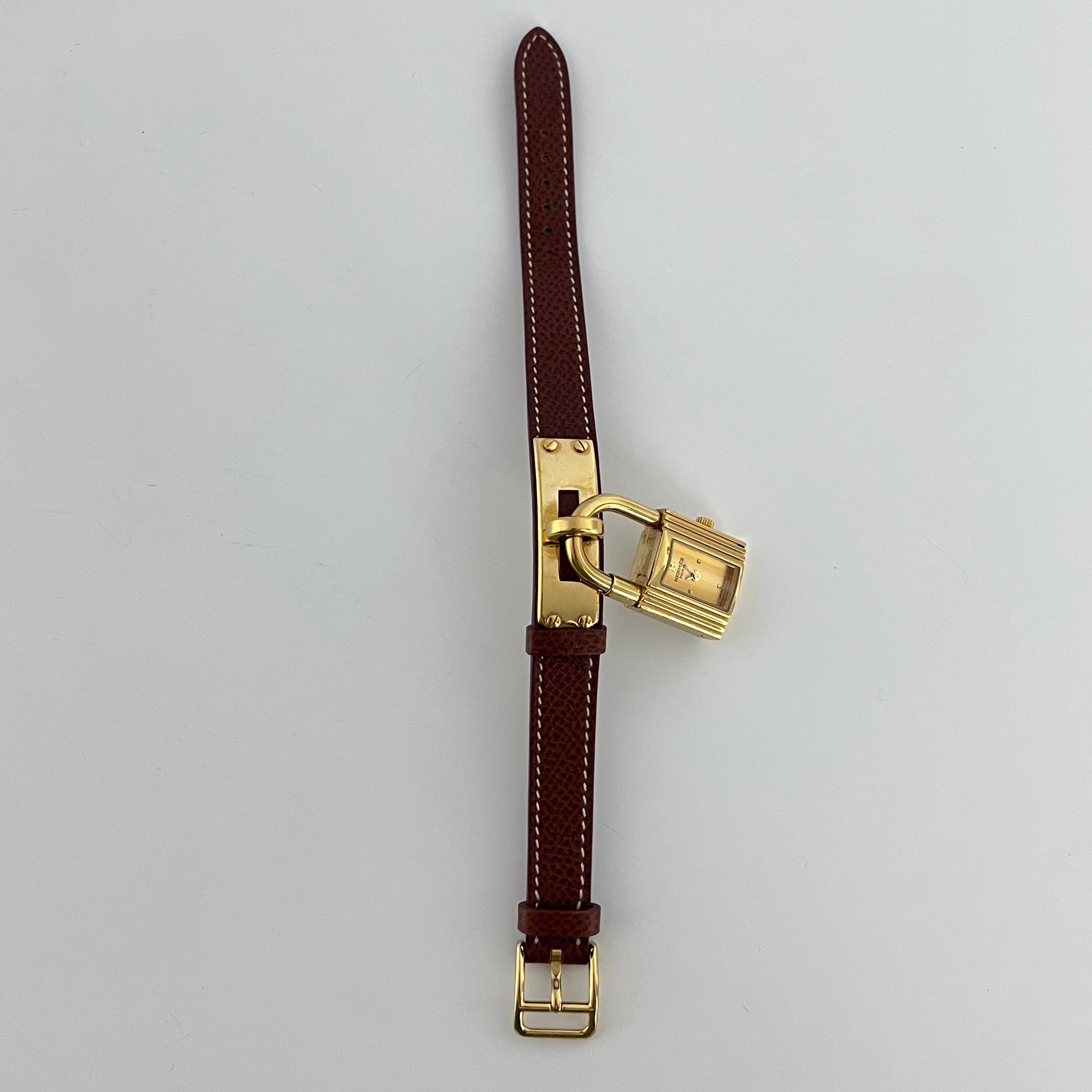 Montre HERMÈS Kelly plaqué or dorée