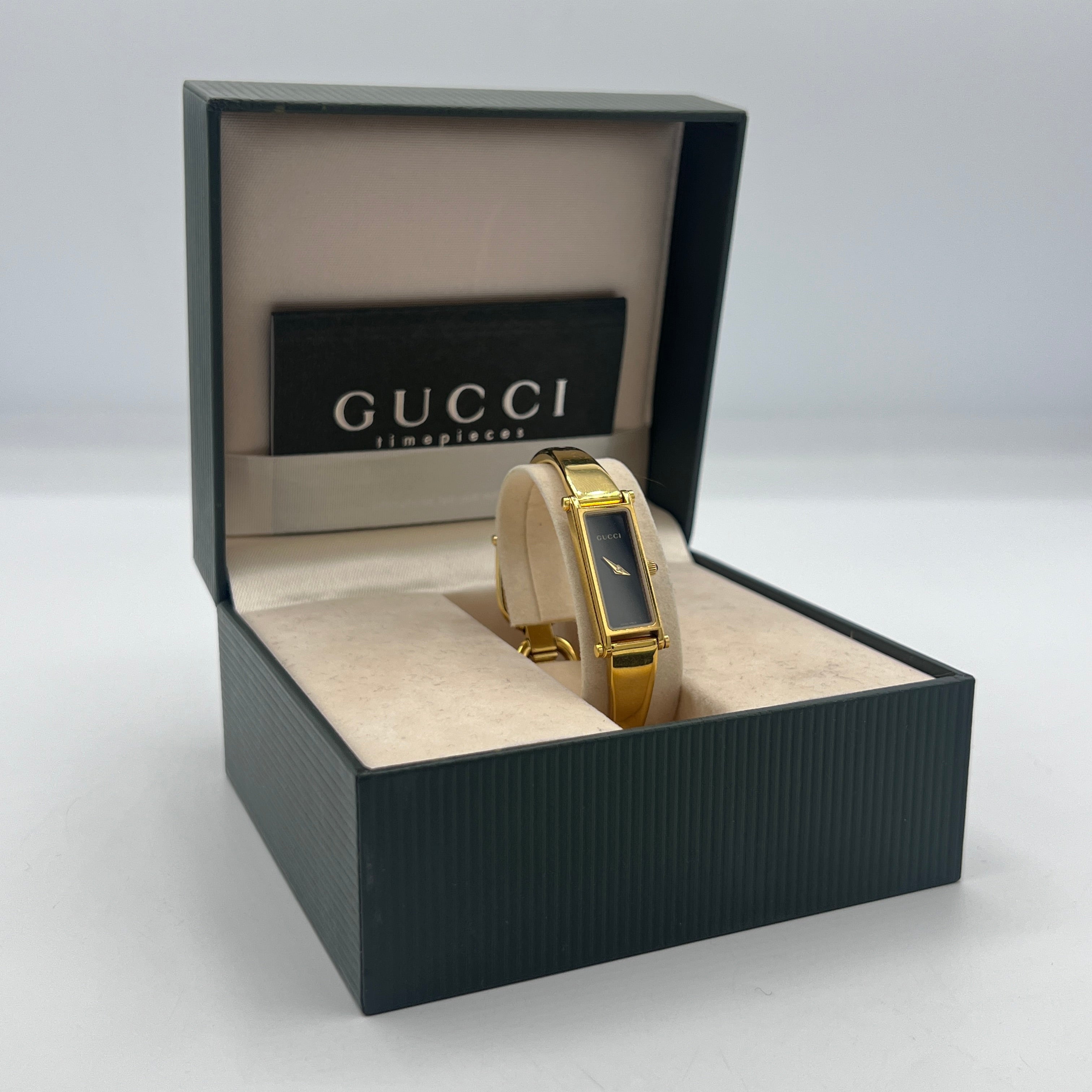 Montre GUCCI 1500 L plaqué or dorée