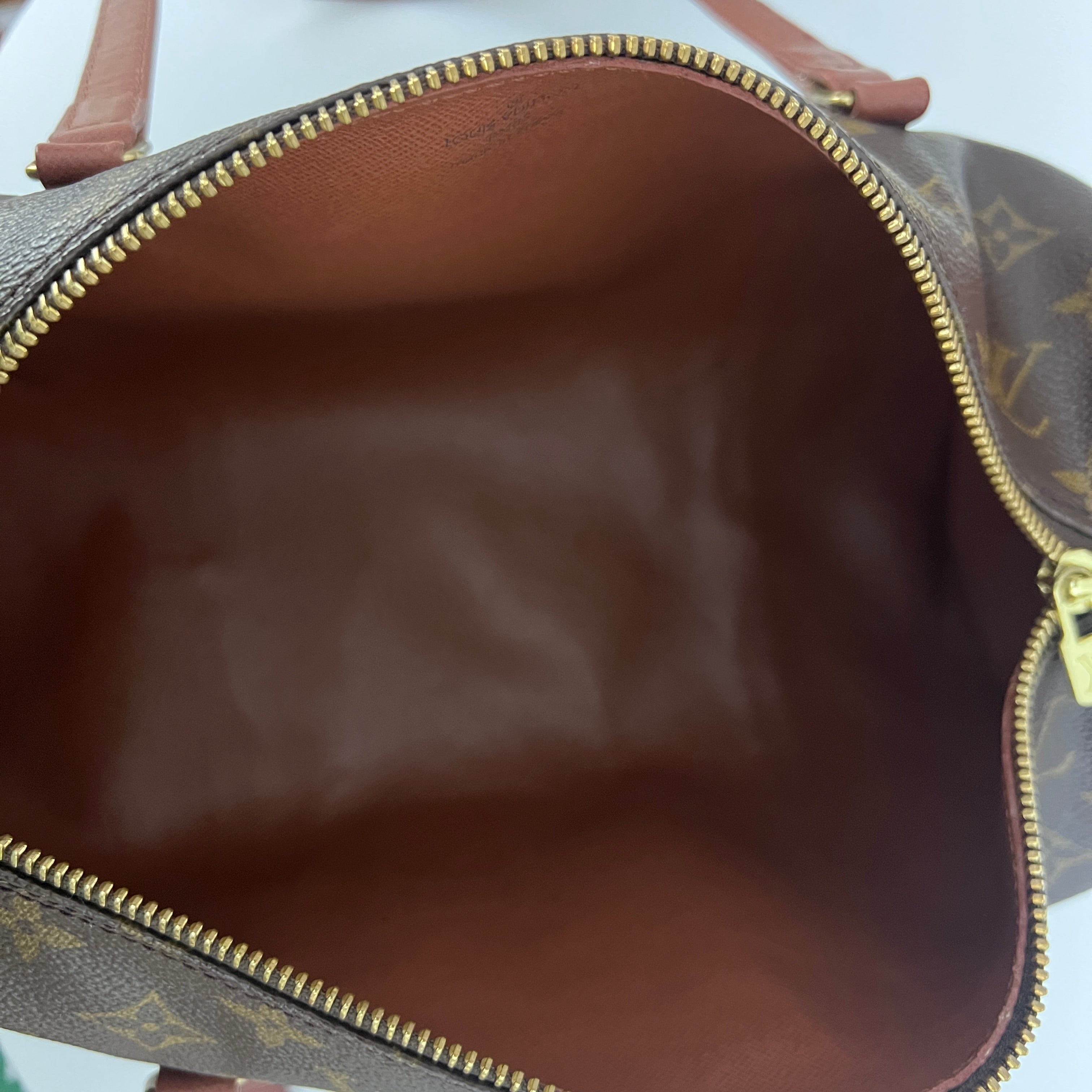 LOUIS VUITTON Papillon bag in canvas and brown leather