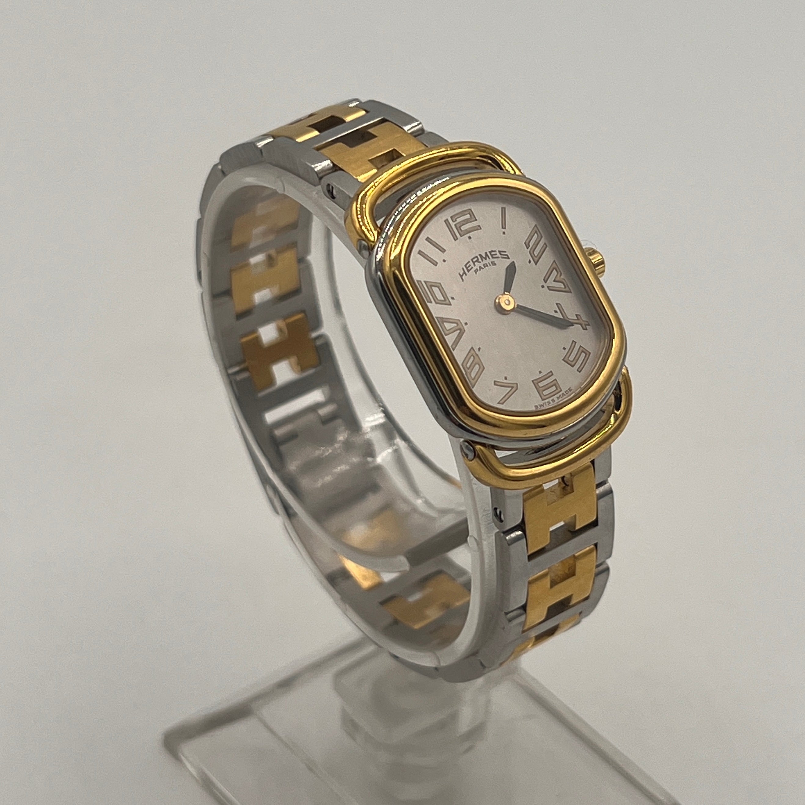 Montre HERMÈS Rallye plaqué or et acier bicolore