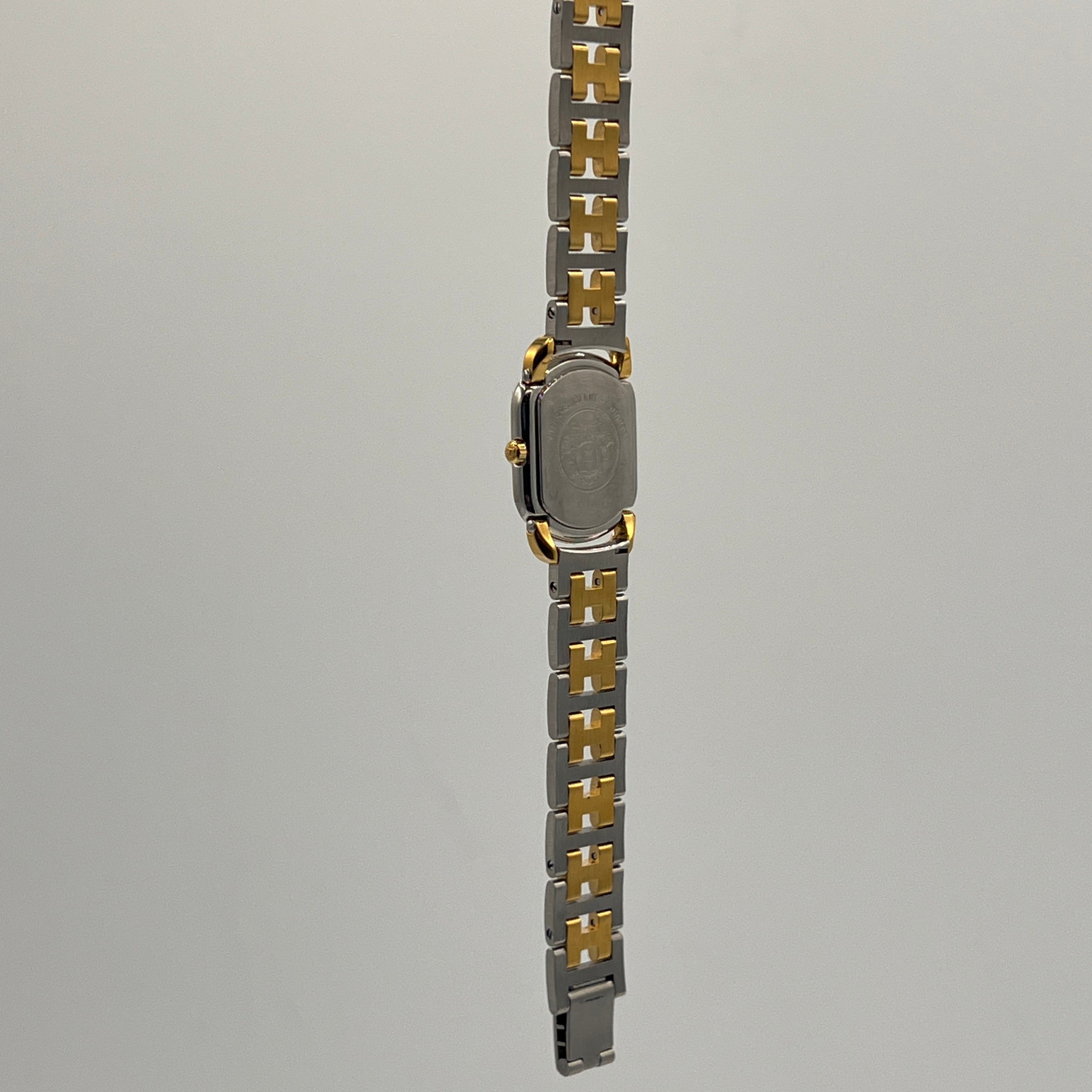 Montre HERMÈS Rallye plaqué or et acier bicolore