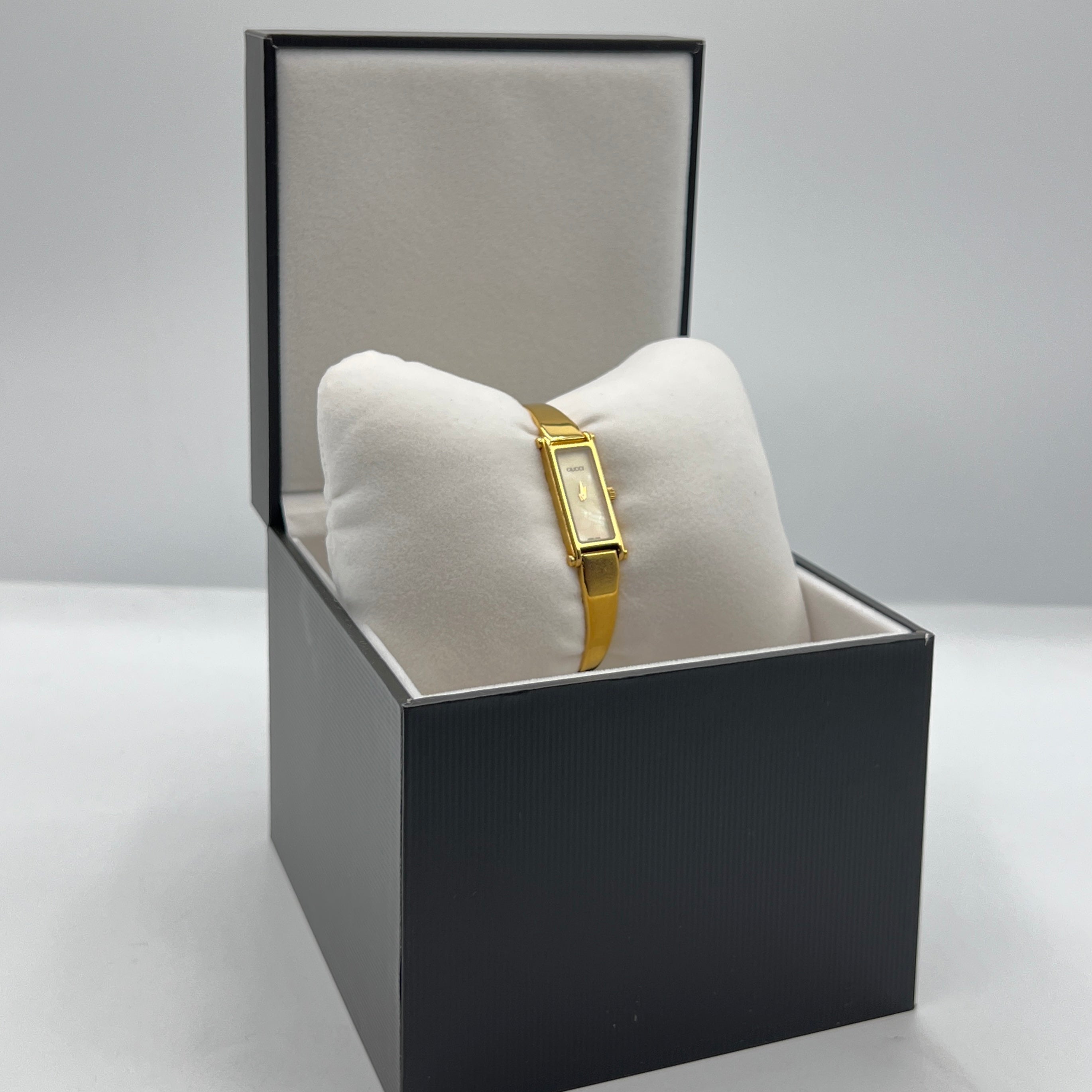 Montre GUCCI 1500 plaqué or doré