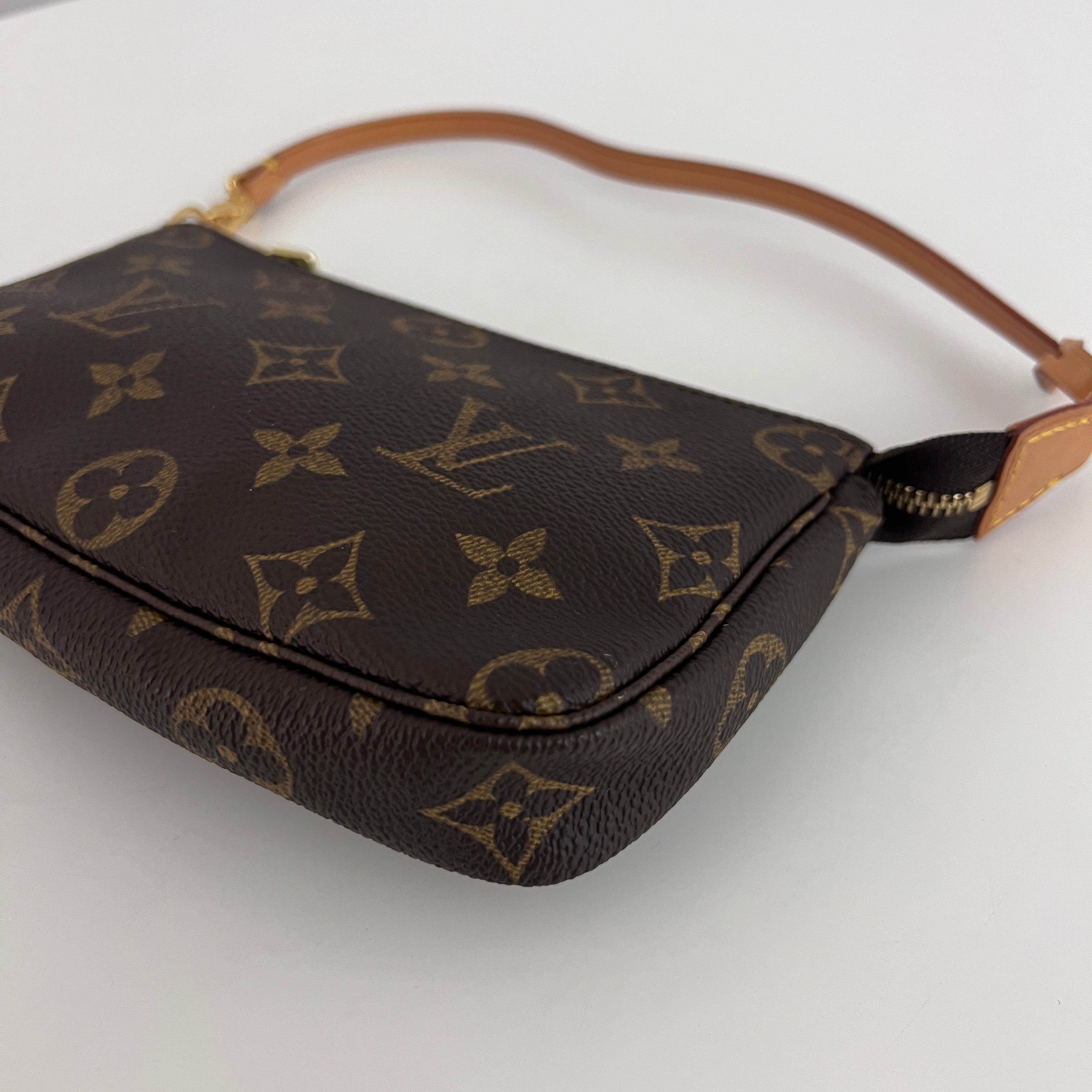 Sac LOUIS VUITTON Mini Pochette Accessoires toile et cuir marron vintage 2003