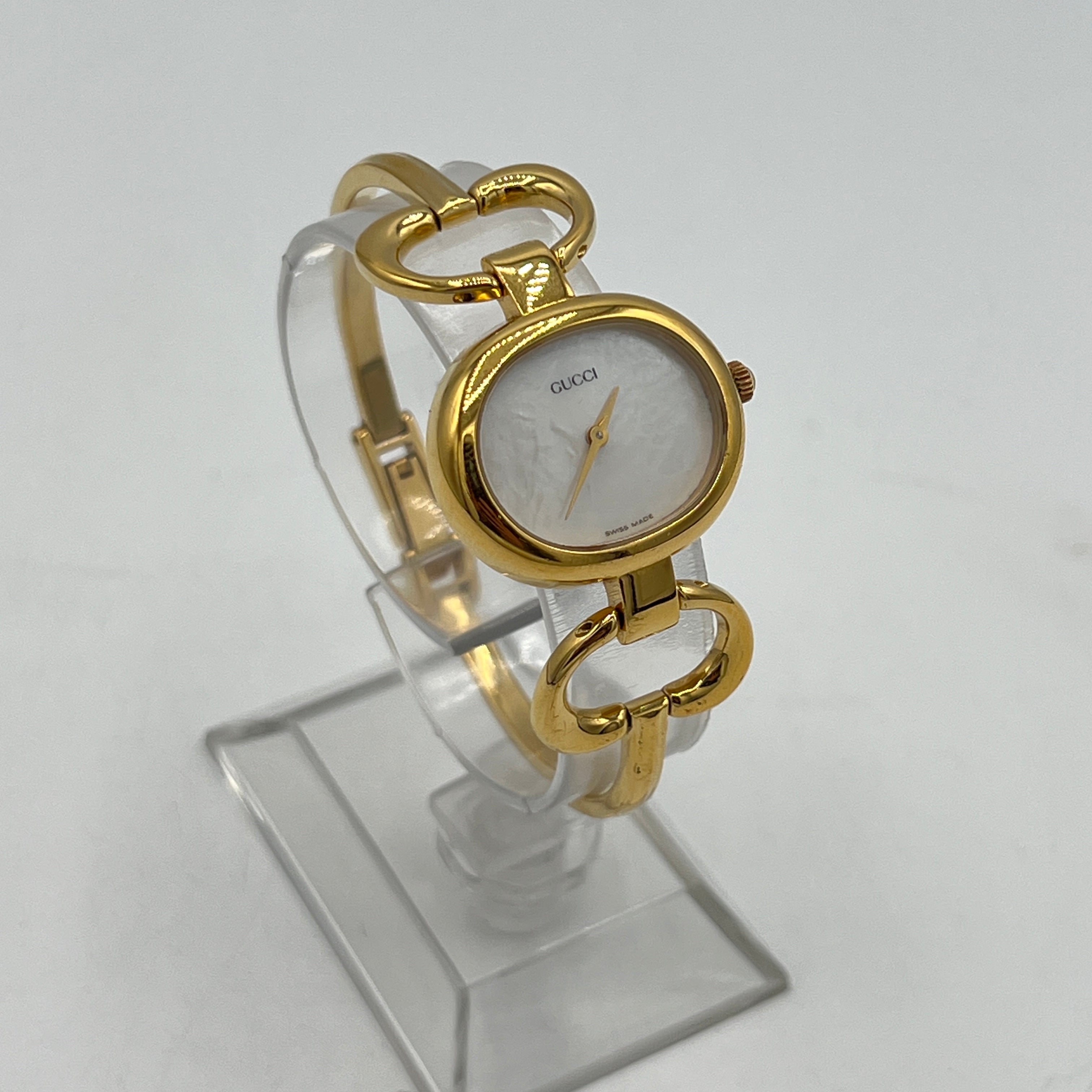 Montre GUCCI 1600 plaqué or doré