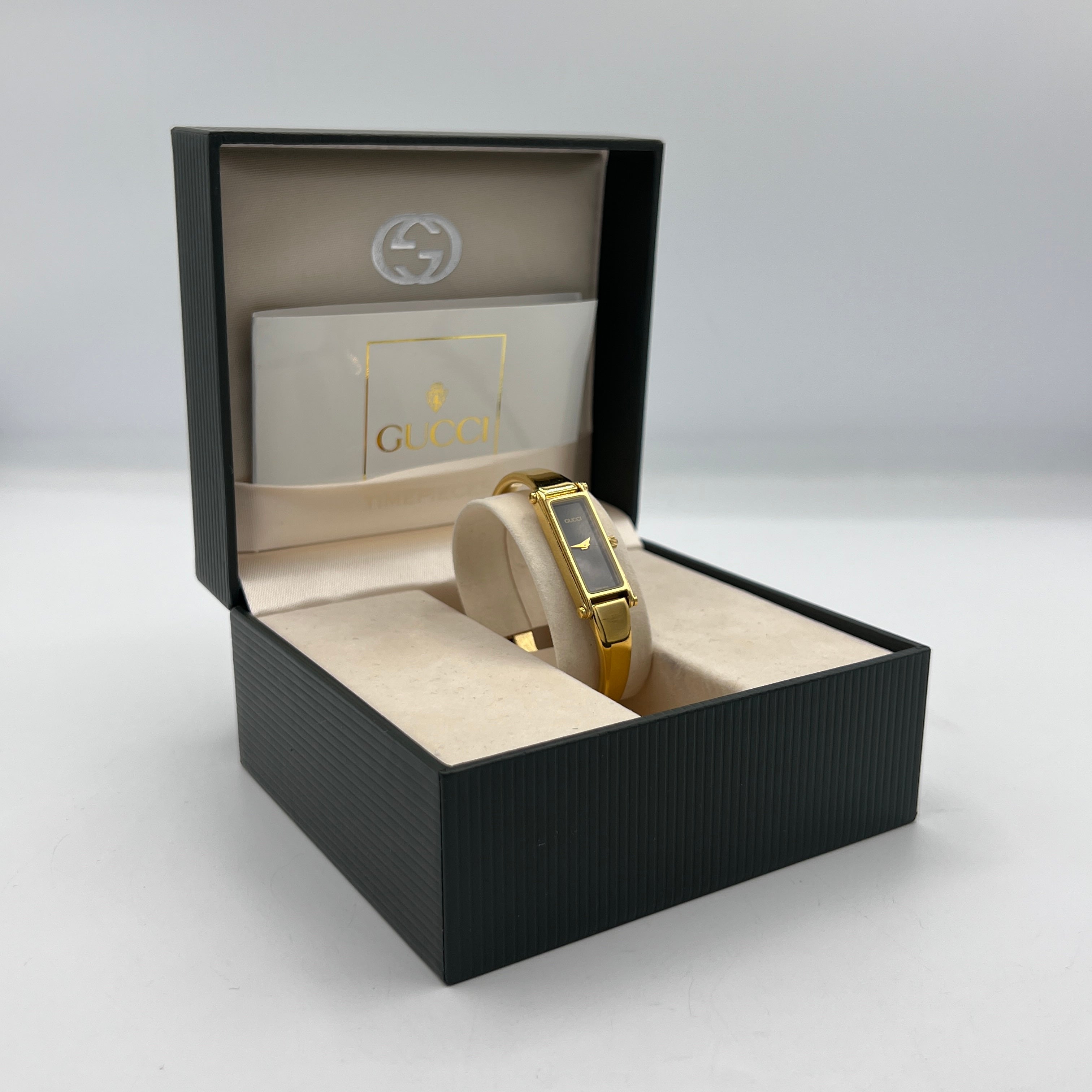 Montre GUCCI 1500 plaqué or doré