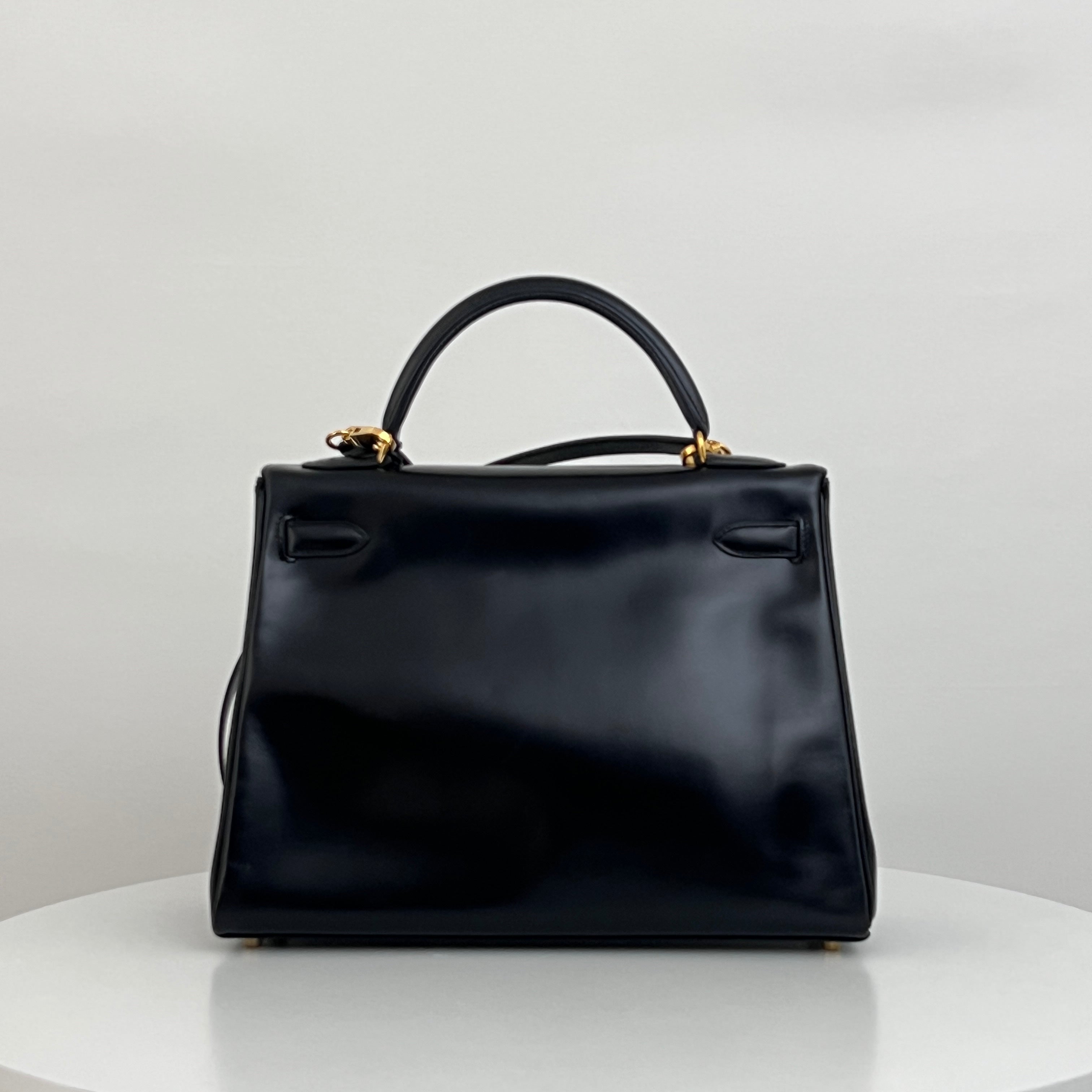 HERMÈS Kelly 32 black retourne box leather shoulder bag