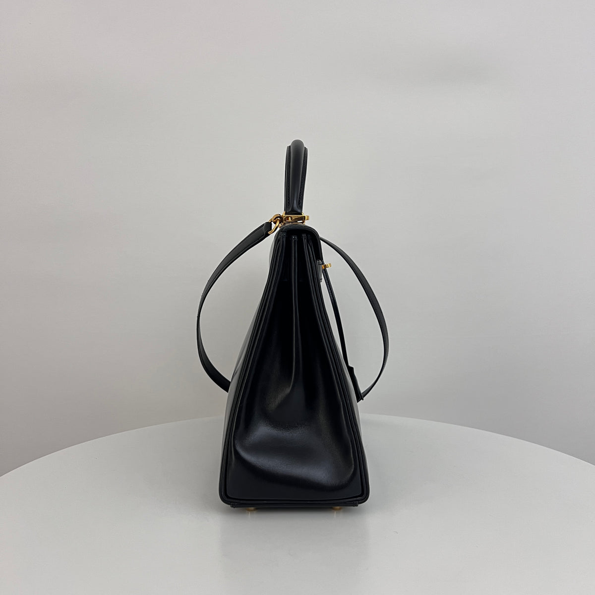 HERMÈS Kelly 32 black retourne box leather shoulder bag