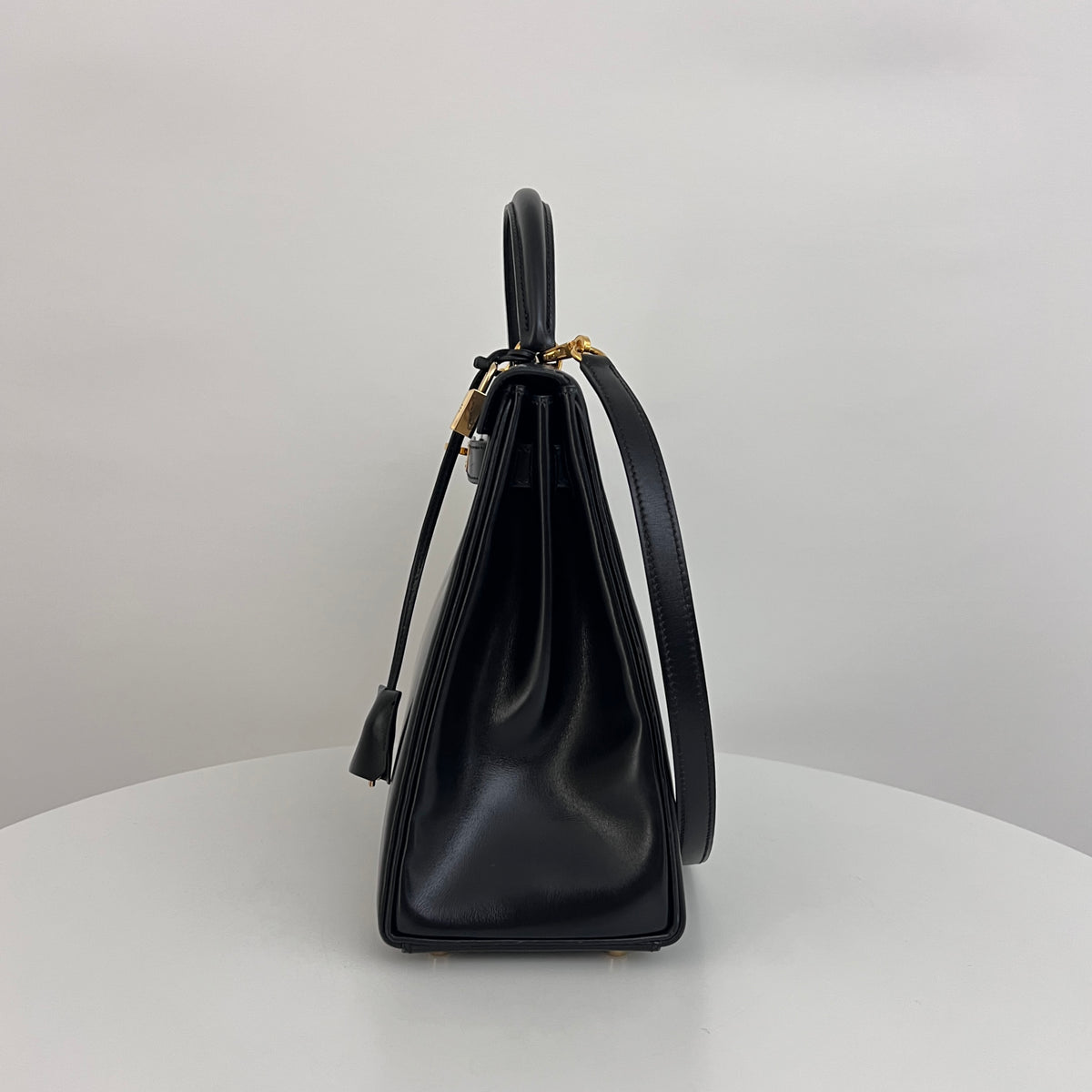 HERMÈS Kelly 32 black retourne box leather shoulder bag