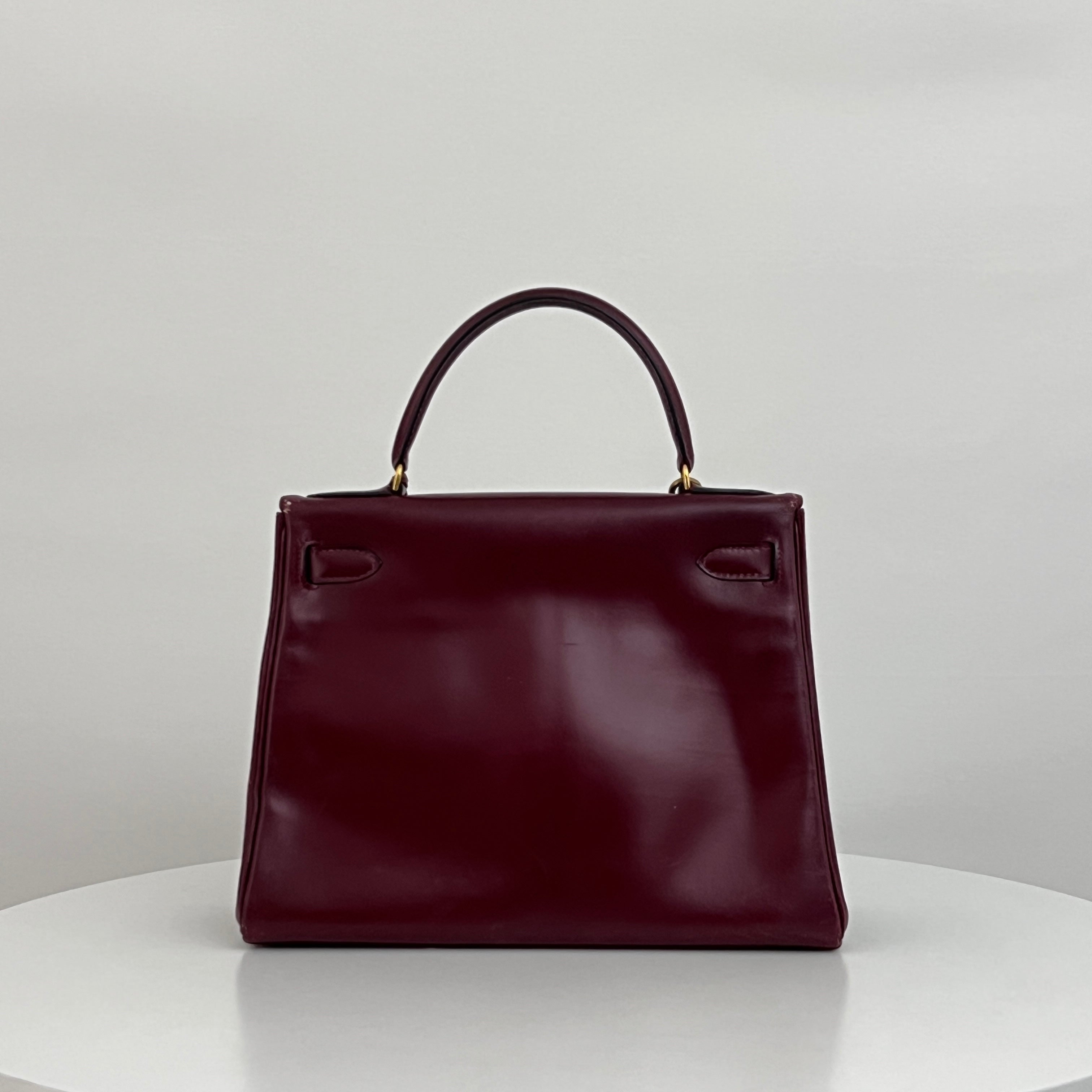 HERMÈS Kelly 28 Bordeaux Retourné Box Leather Bag