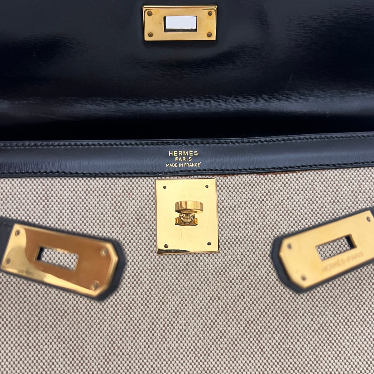 Sac HERMÈS Kelly 32 toile et cuir beige