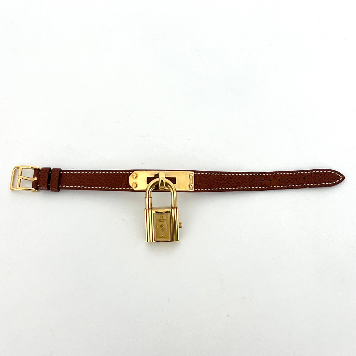 Montre HERMÈS Kelly plaqué or doré