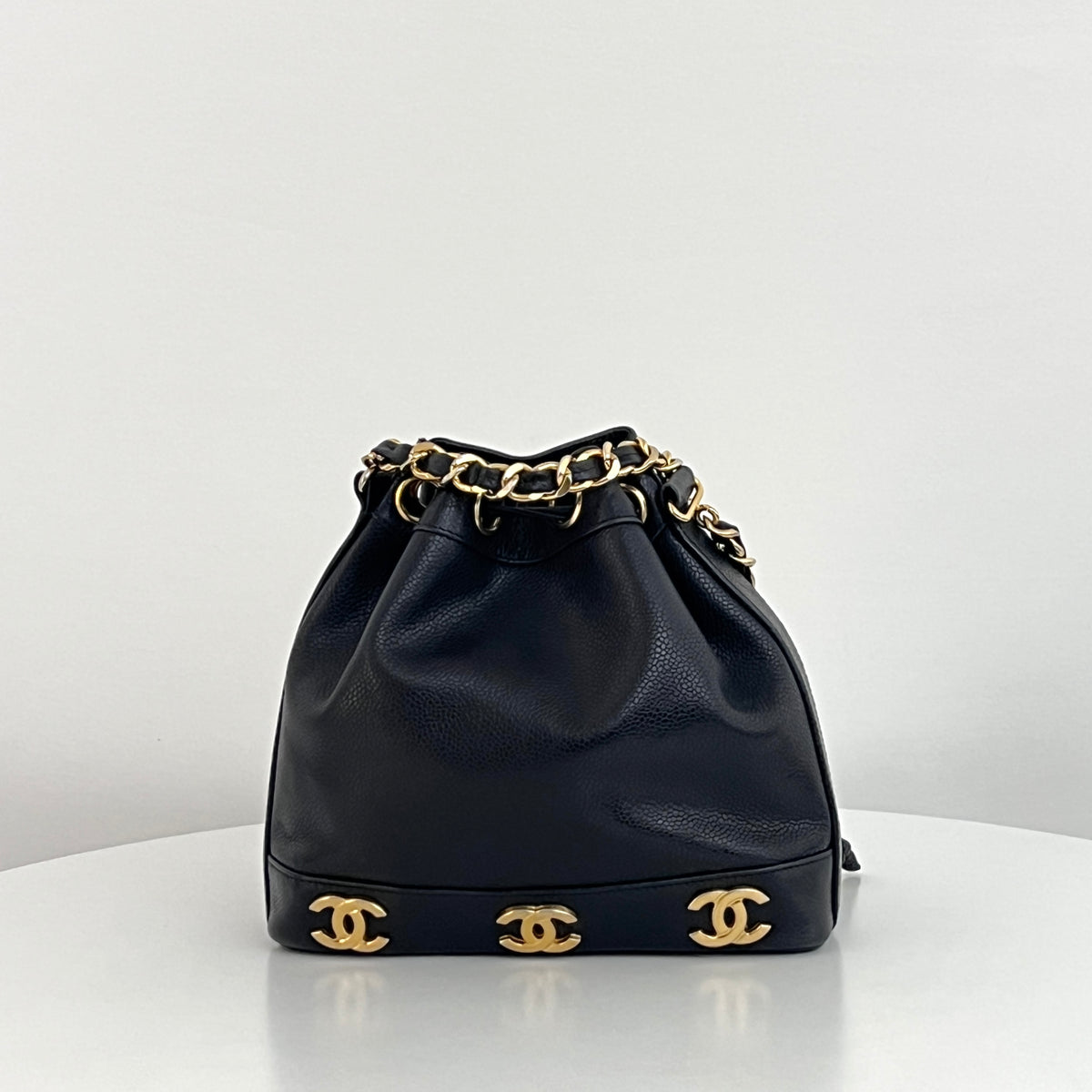 Vintage 1996-1997 CHANEL black lambskin mini bucket bag