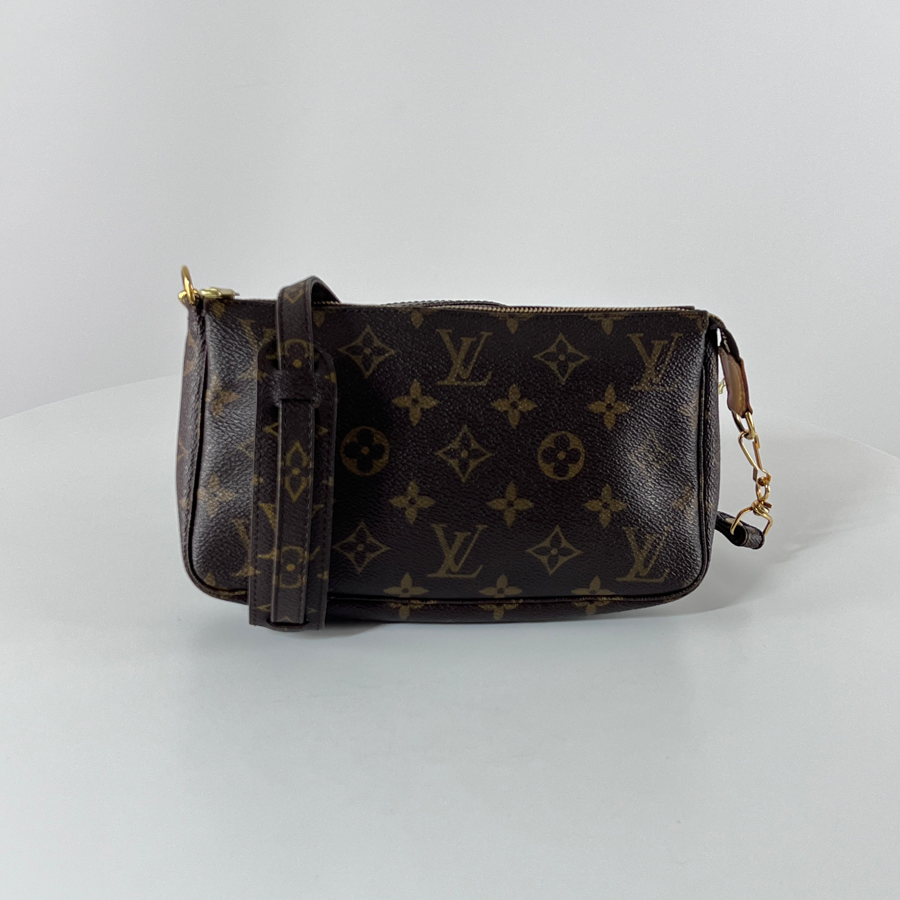 Sac à main LOUIS VUITTON Accessory Pouch toile et cuir marron