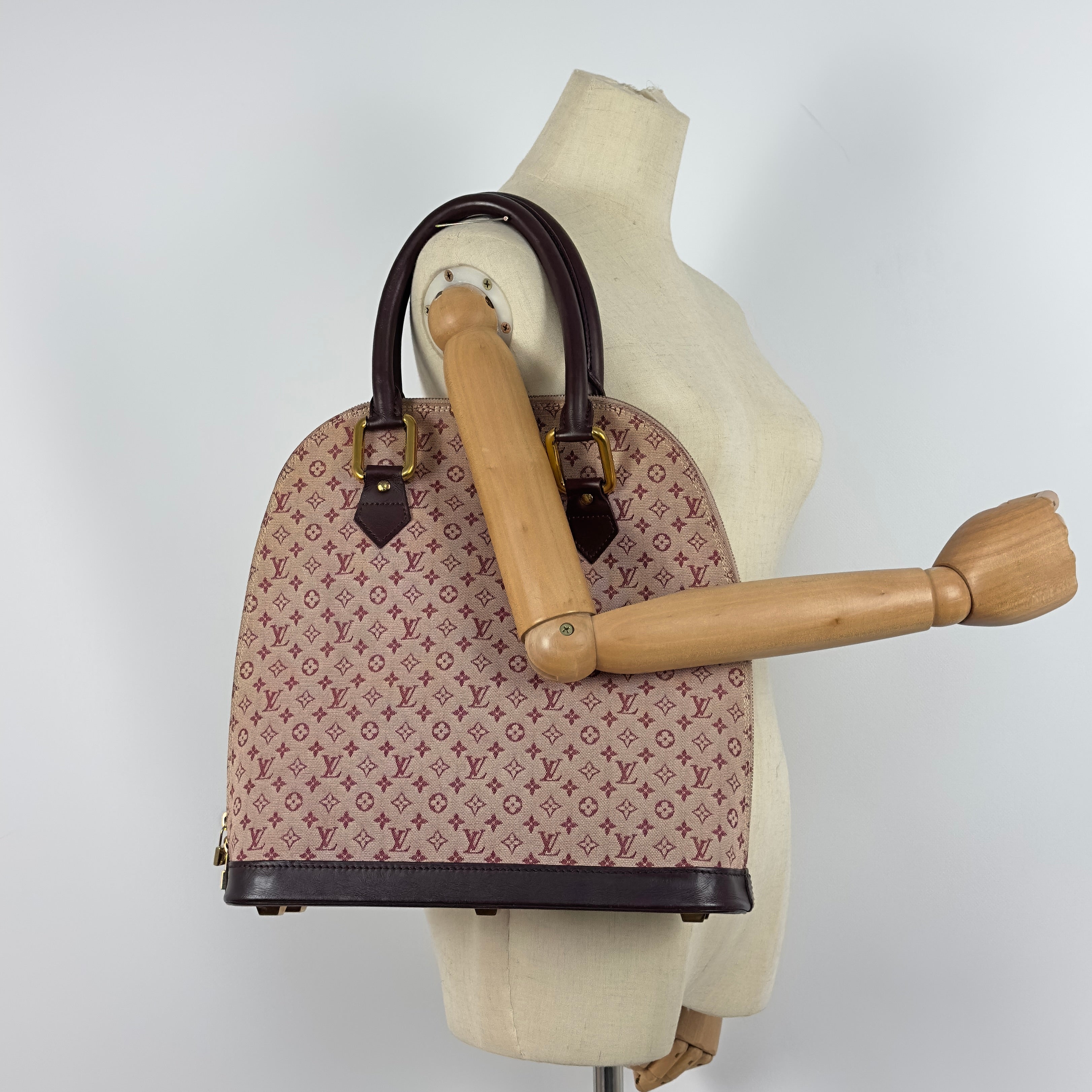 Sac à main LOUIS VUITTON Alma Haut toile et cuir rose