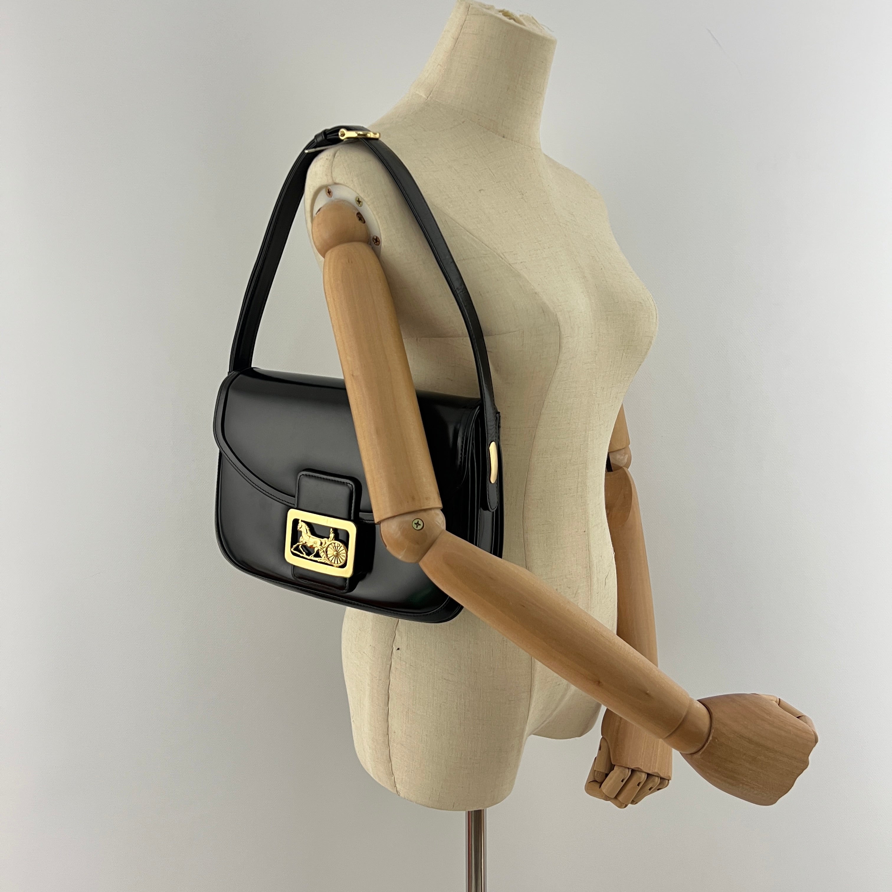 Sac à main CELINE Triomphe cuir noir