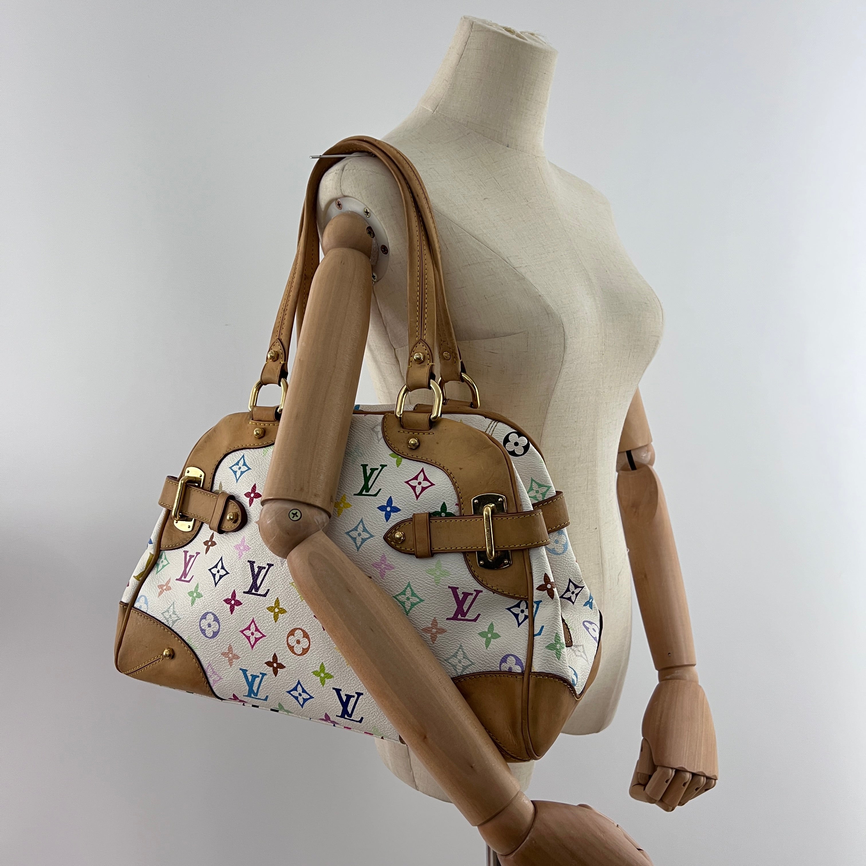 Sac à main LOUIS VUITTON Claudia toile et cuir marron