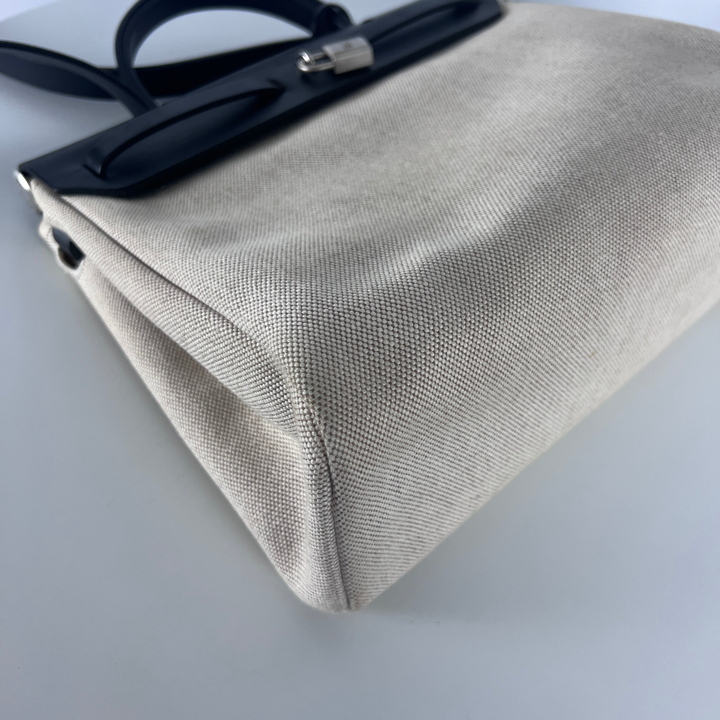 HERMÈS Herbag canvas and black leather handbag