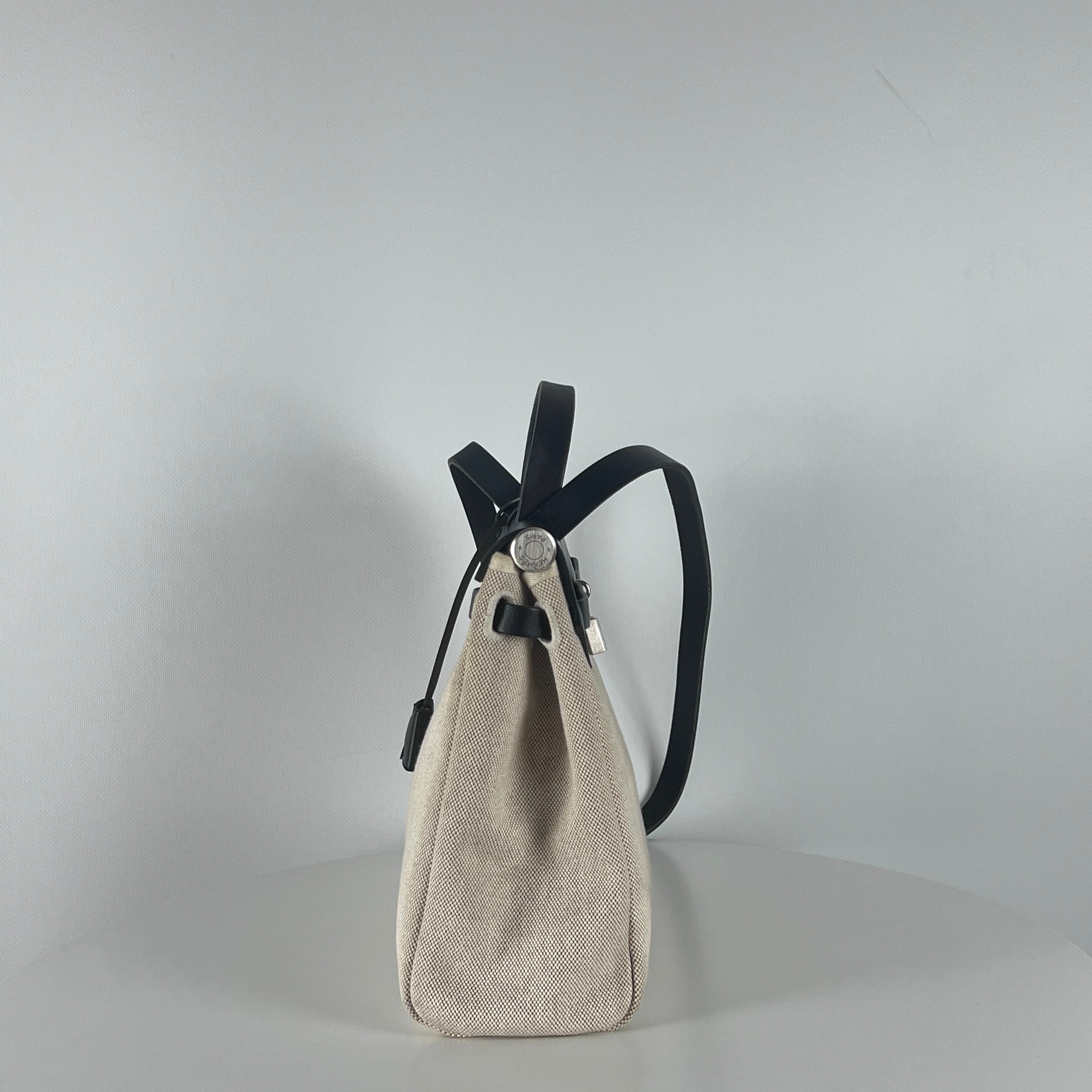 HERMÈS Herbag canvas and black leather handbag