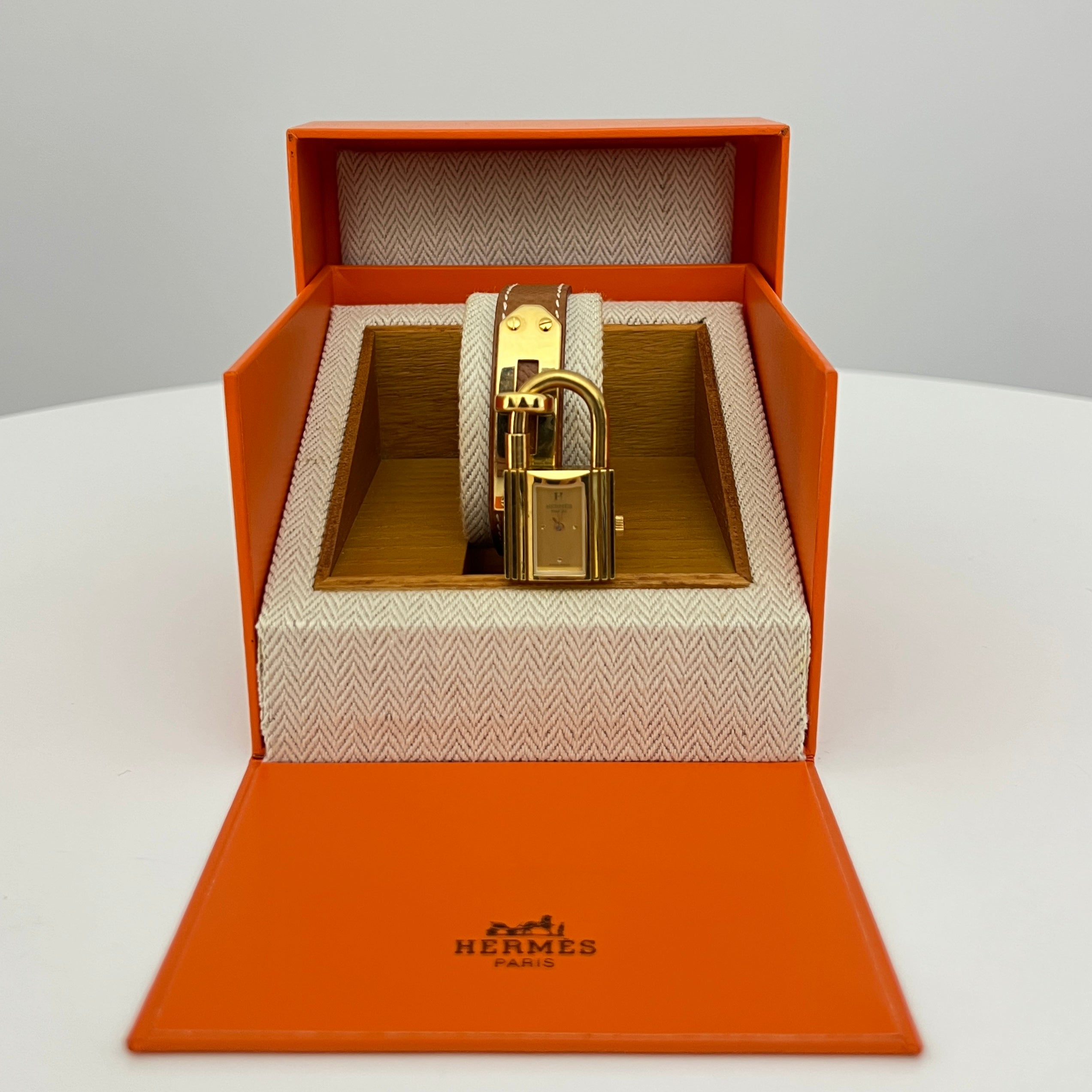 Montre HERMÈS Kelly plaquée or dorée