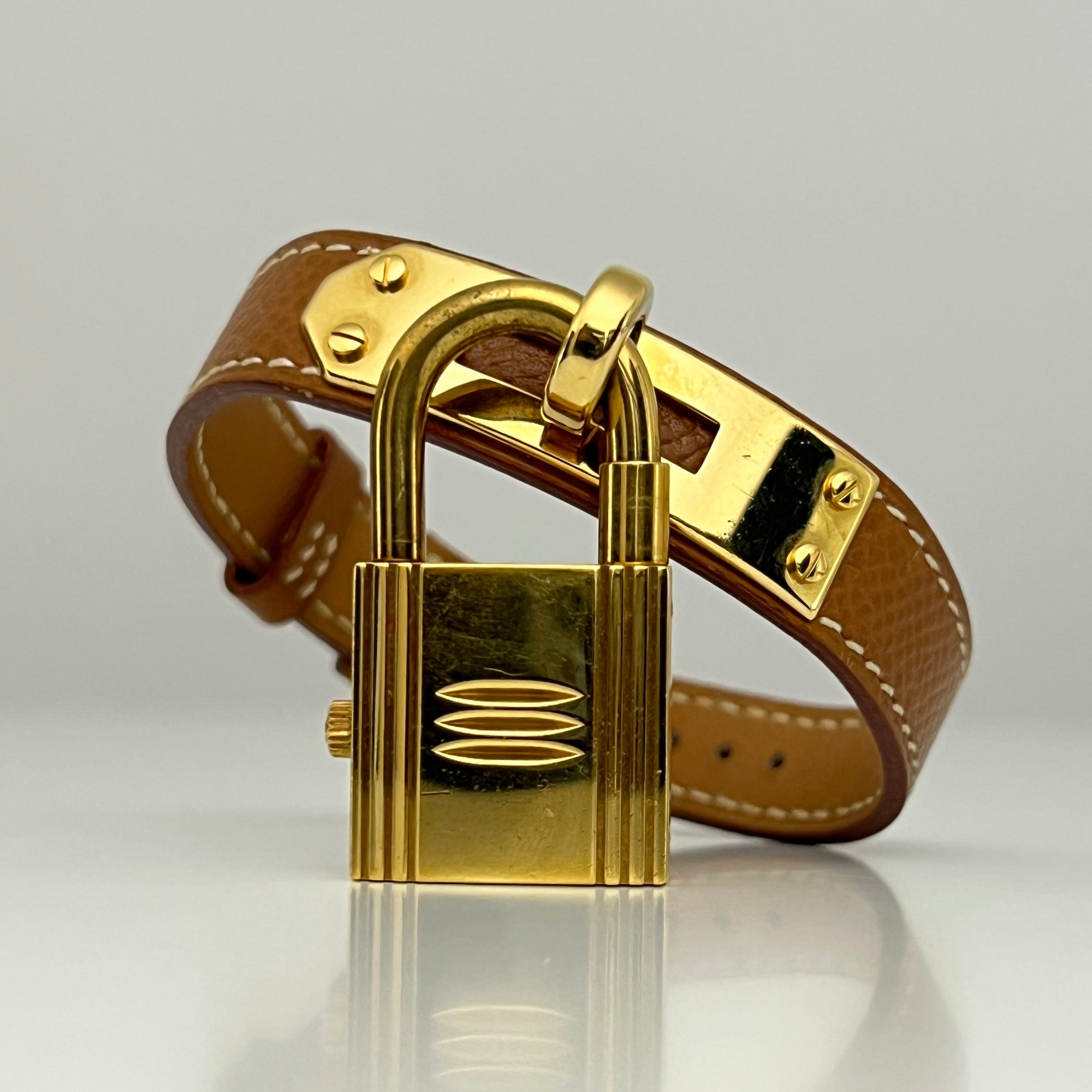 Montre HERMÈS Kelly plaquée or dorée