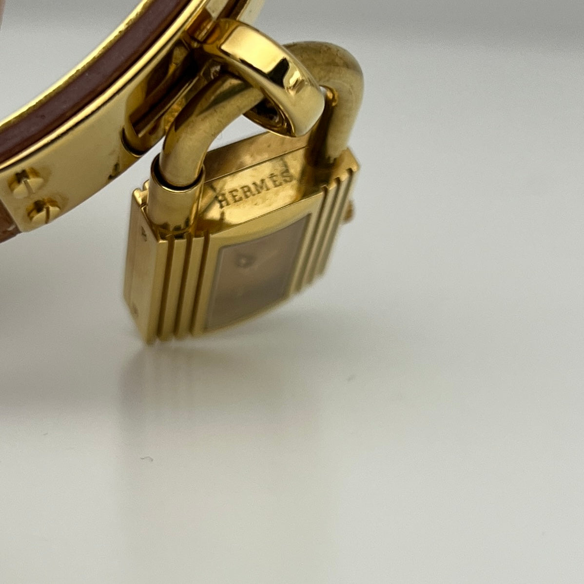 Montre HERMÈS Kelly plaquée or dorée