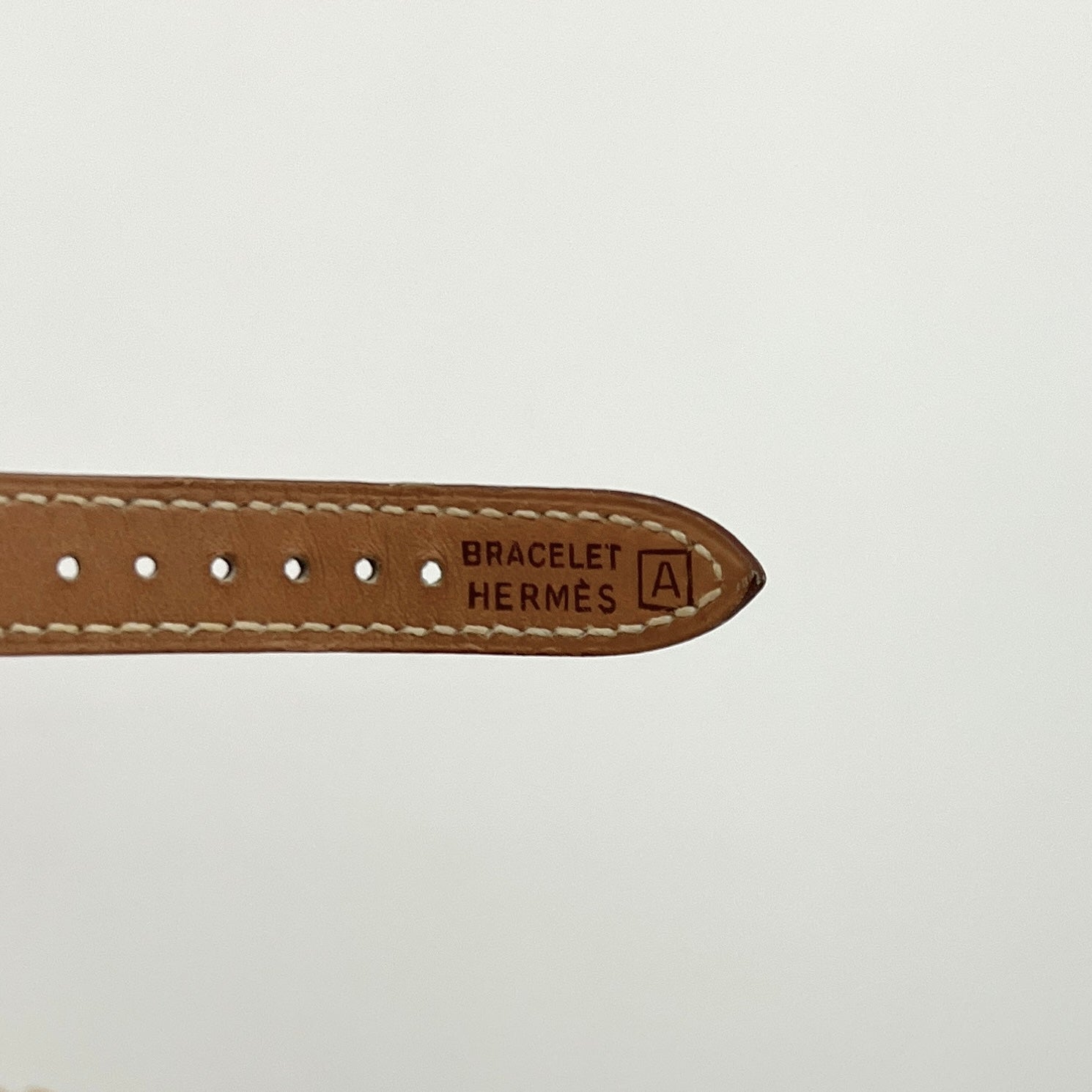 Montre HERMÈS Kelly plaquée or dorée