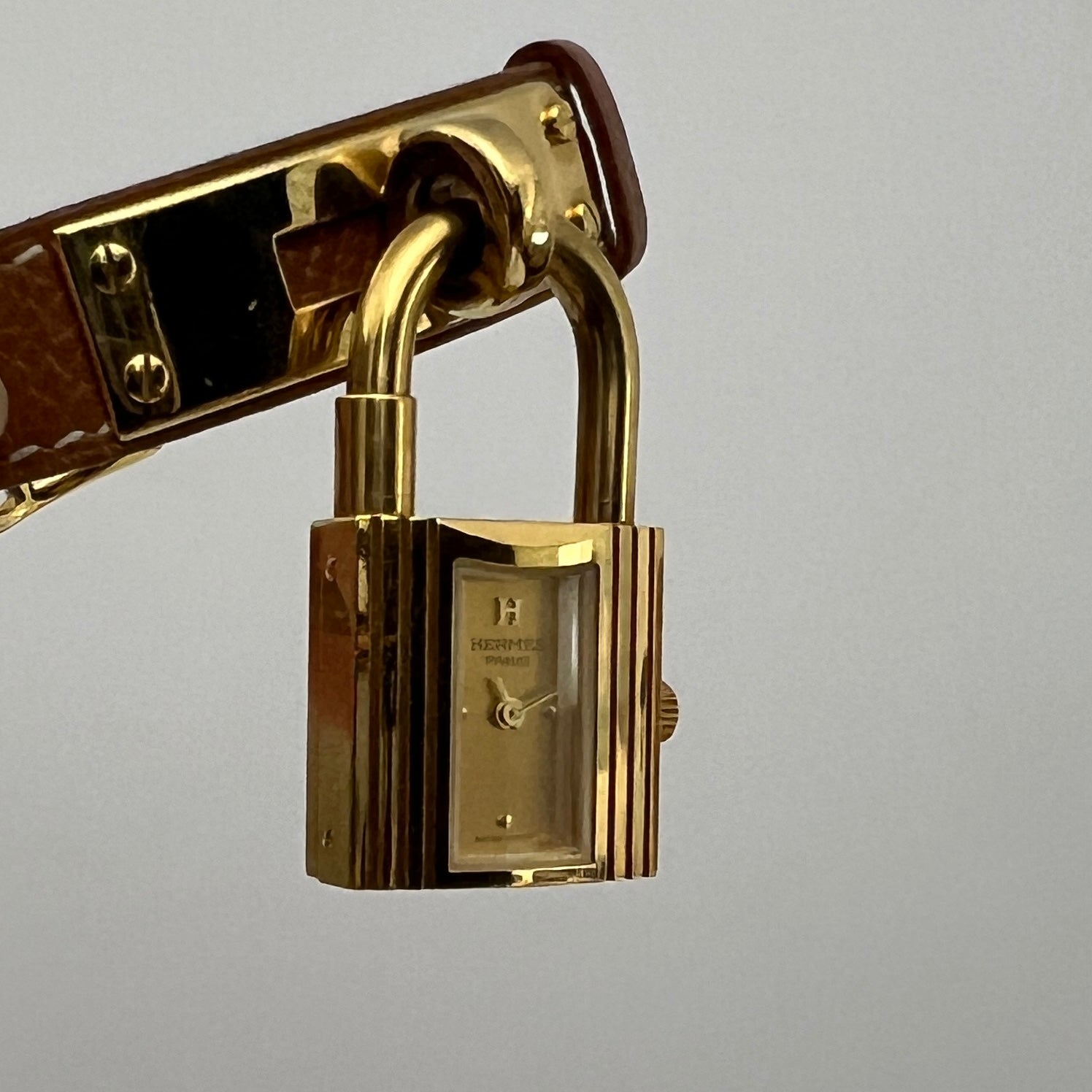 Montre HERMÈS Kelly plaquée or dorée