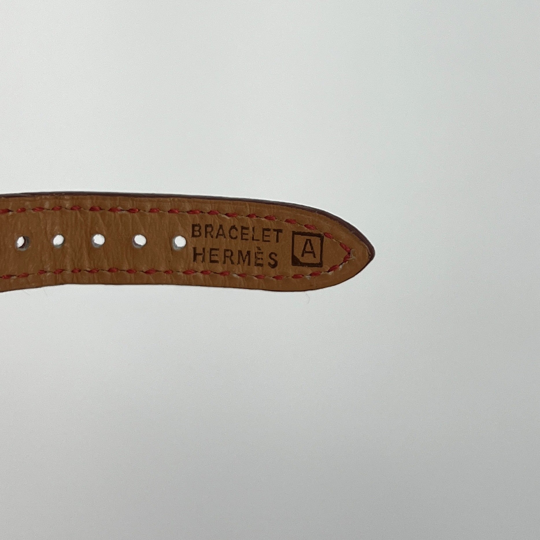 Montre HERMÈS Kelly plaquée or dorée