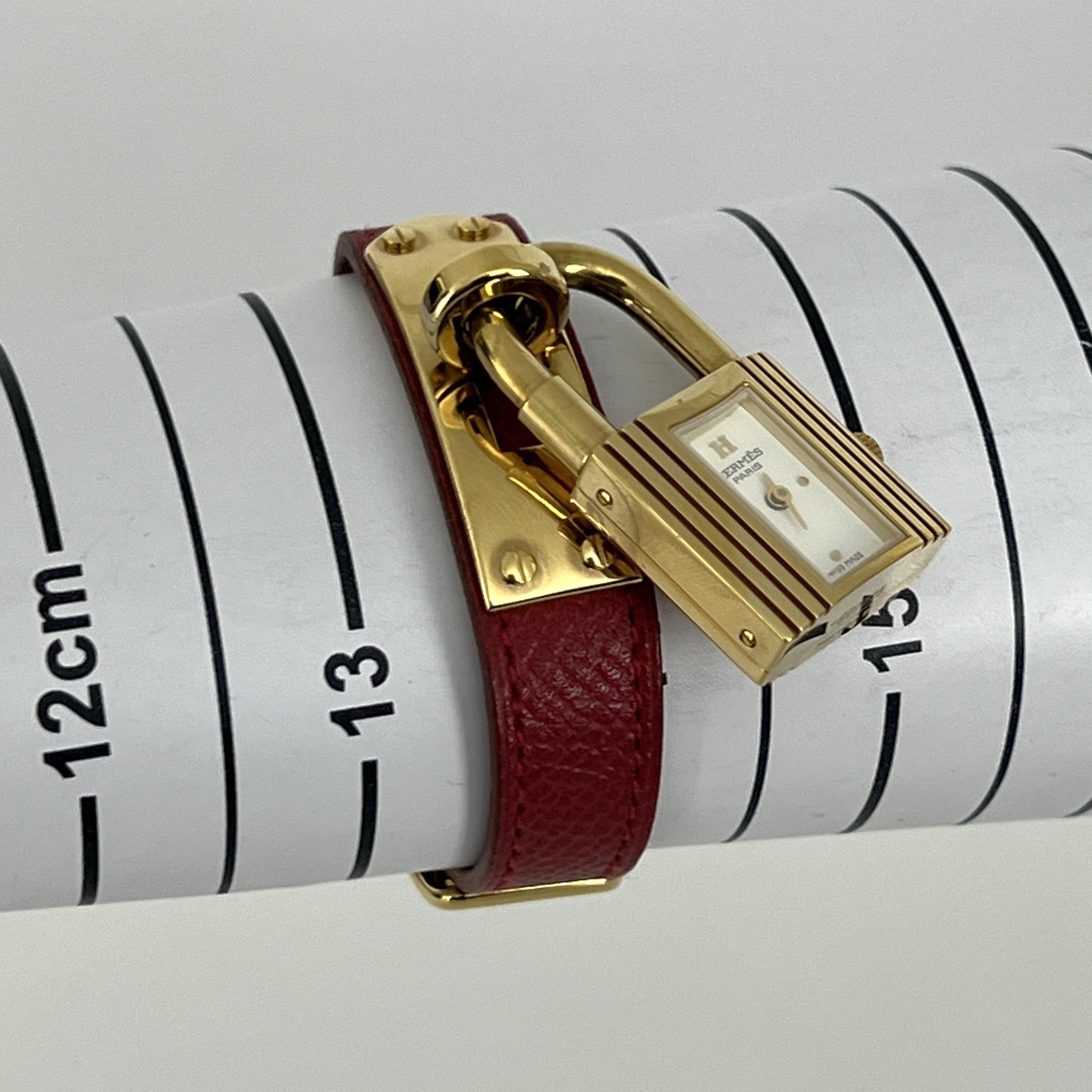 Montre HERMÈS Kelly plaquée or dorée