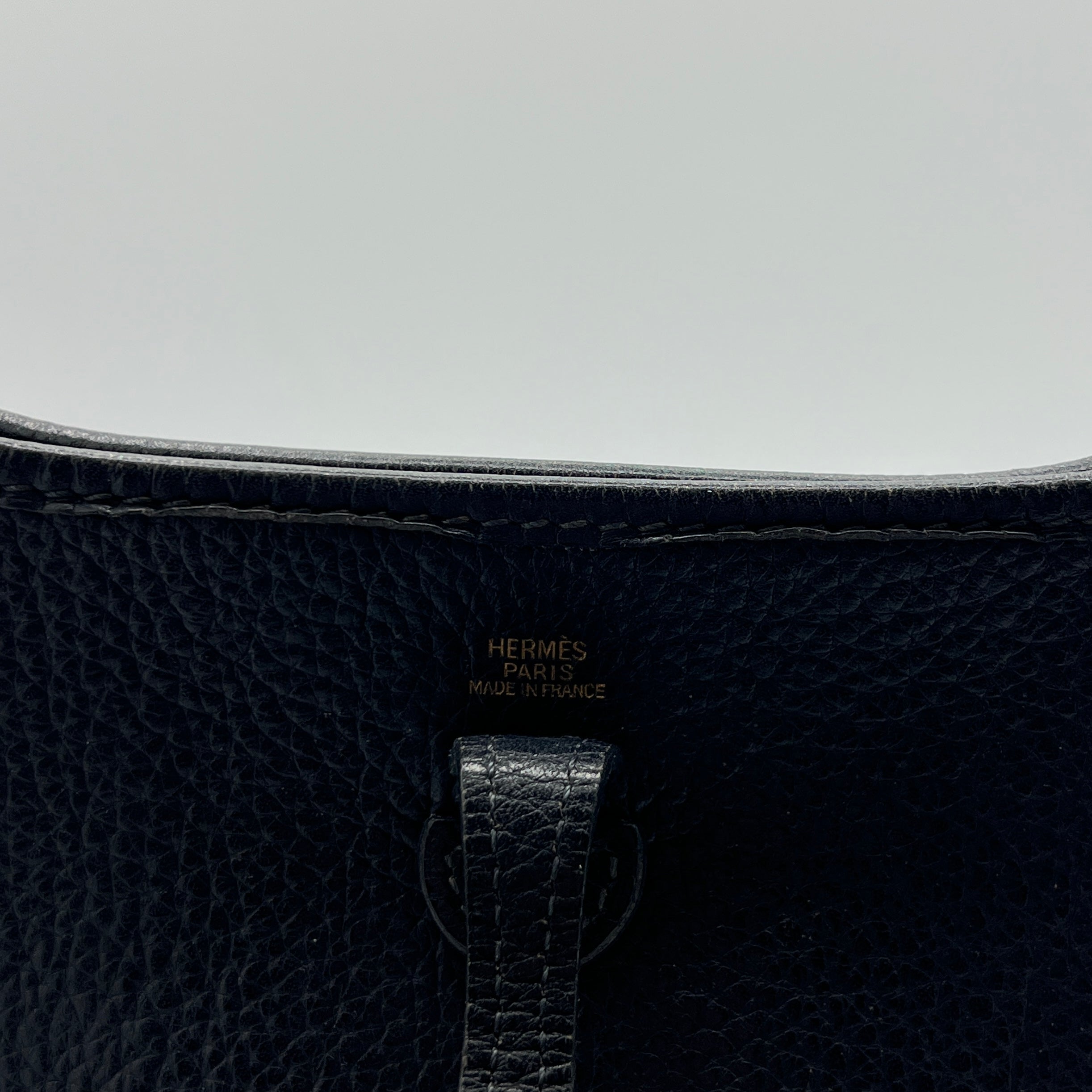 HERMÈS Evelyne TPM (Mini) handbag in blue Clemence leather