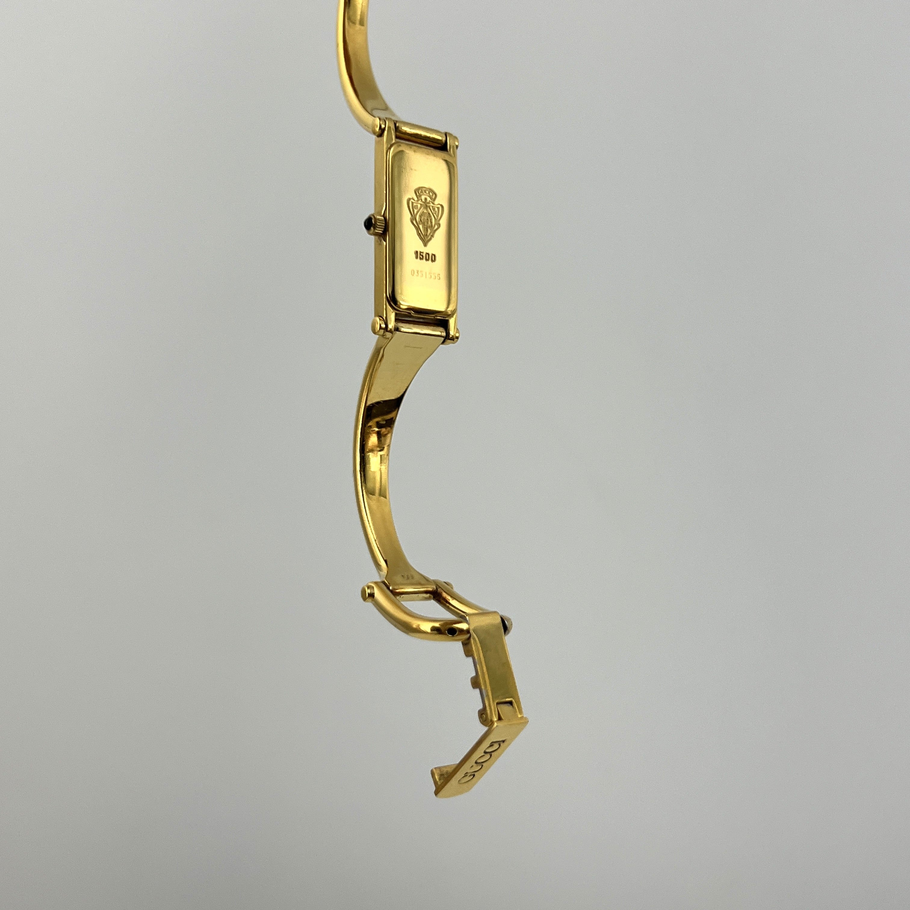 Montre GUCCI 1500 plaqué or doré