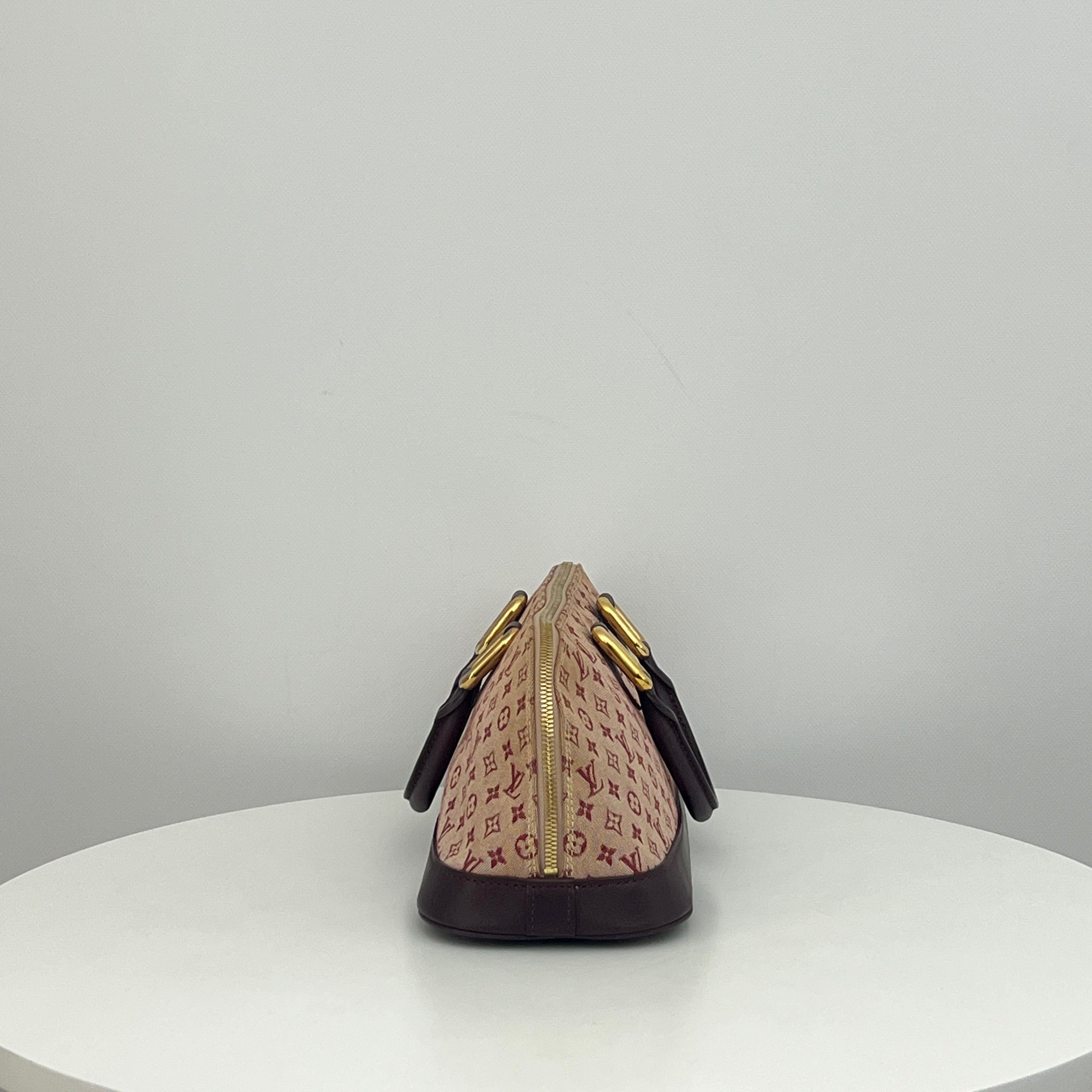 LOUIS VUITTON Alma Long bag in pink canvas and leather