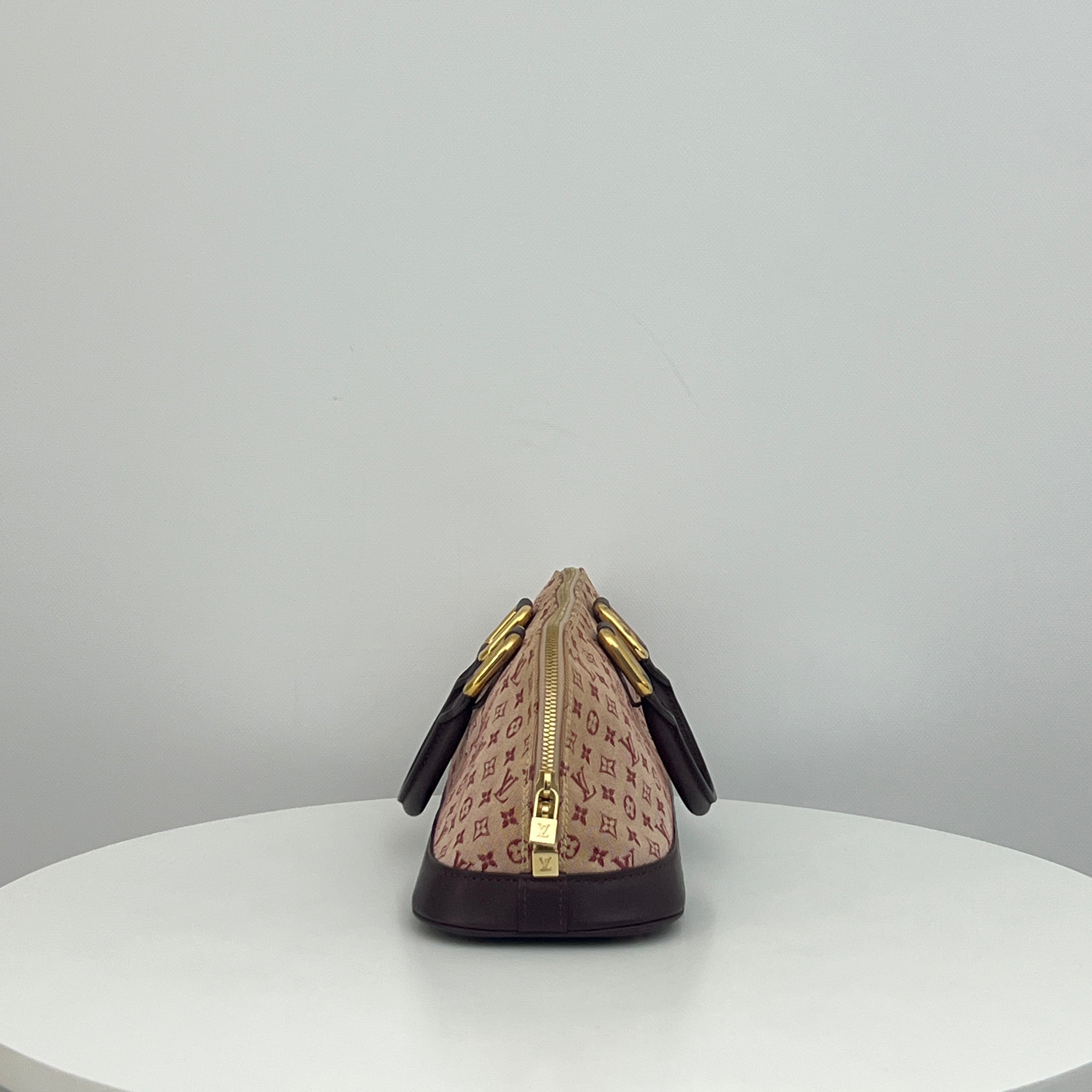 LOUIS VUITTON Alma Long bag in pink canvas and leather