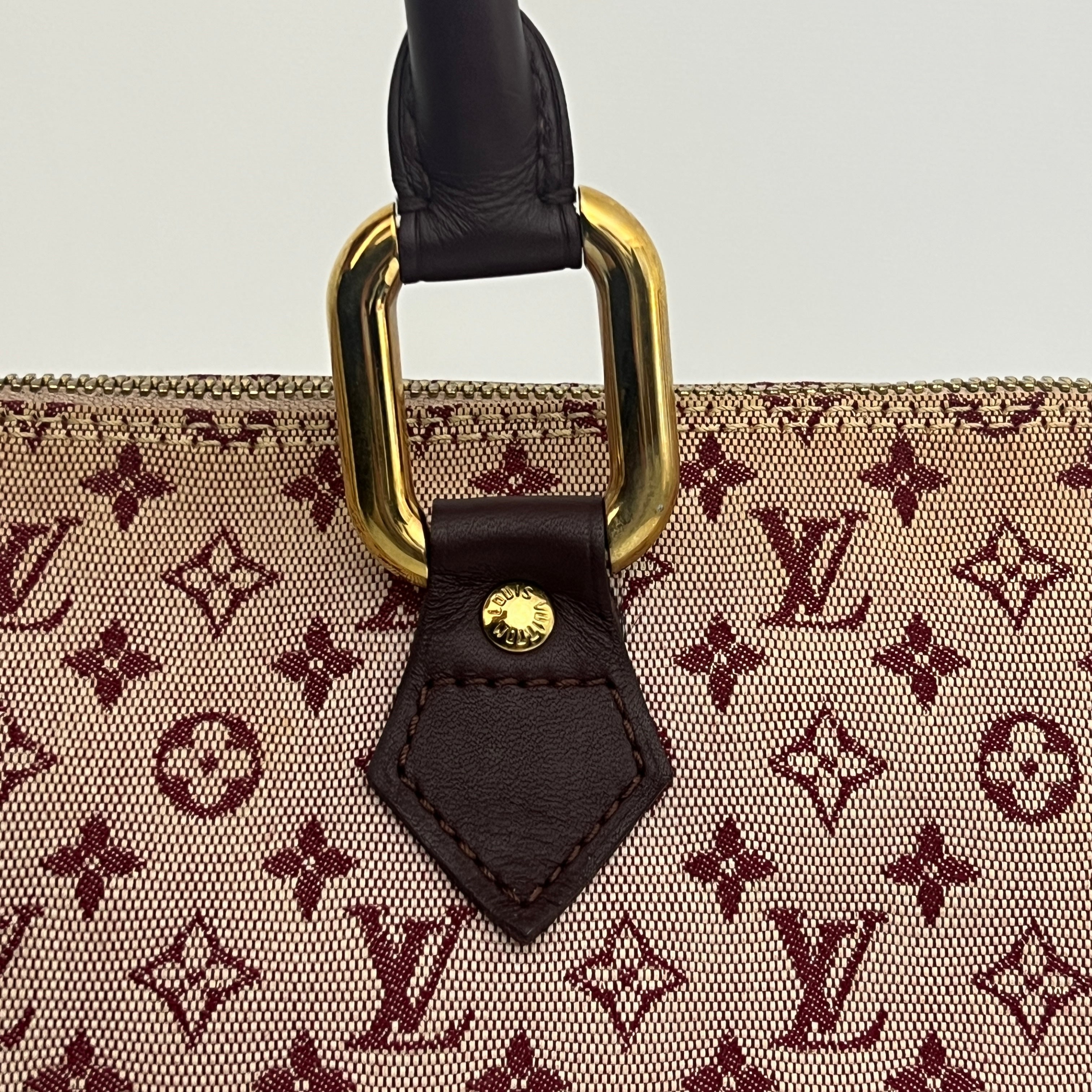 LOUIS VUITTON Alma Long bag in pink canvas and leather